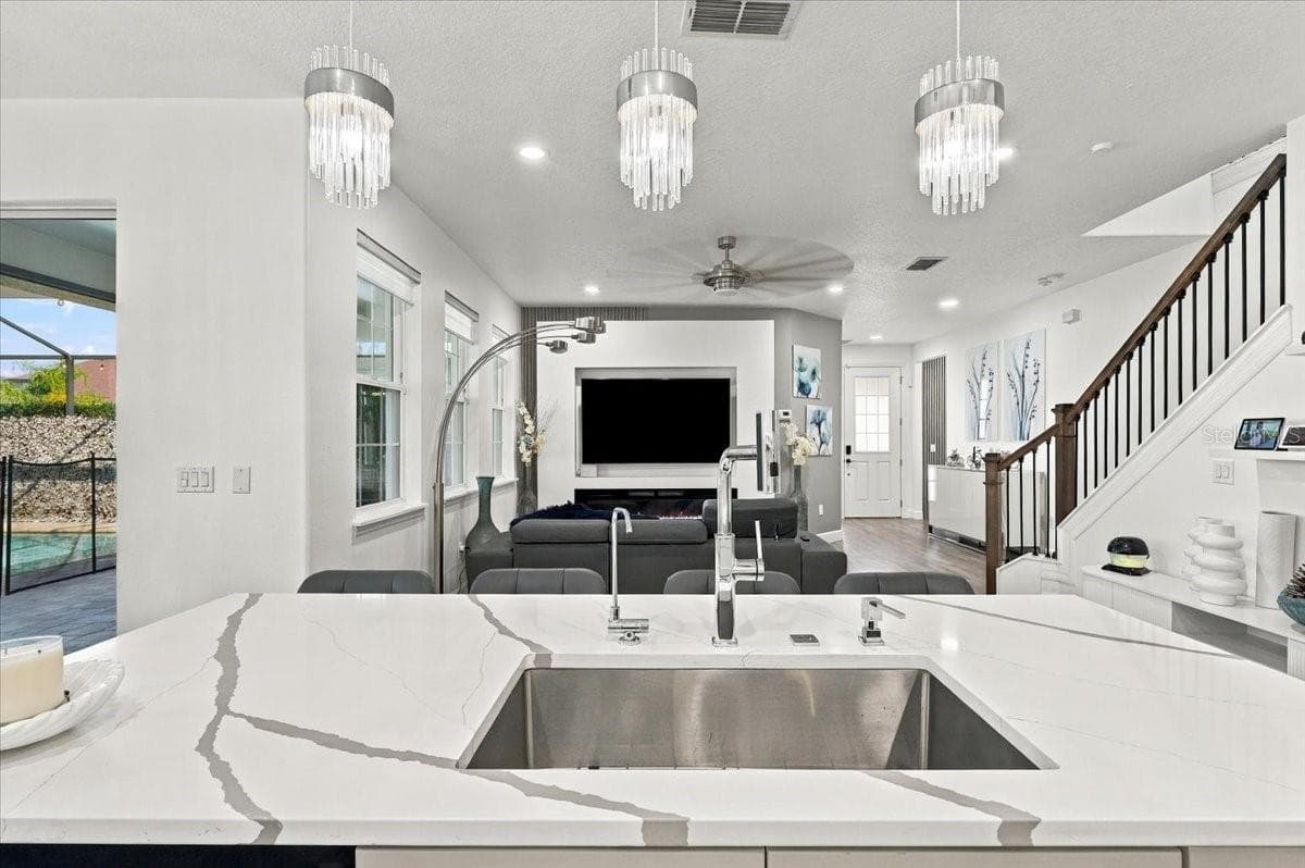 Kitchen view into living room - 3020 CARDILLINO WAY, KISSIMMEE
