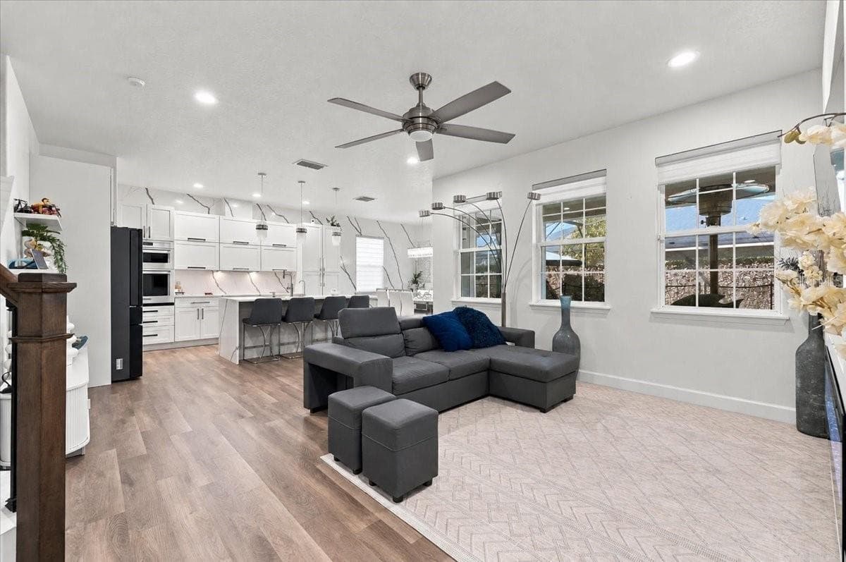 Living room into Kitchen - 3020 CARDILLINO WAY, KISSIMMEE
