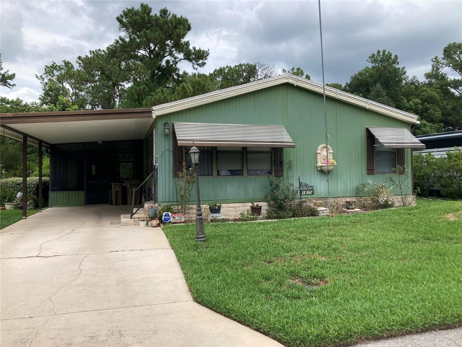 Manufactured Home at 1875 STACEY DR, MOUNT DORA, photo 2 of 39