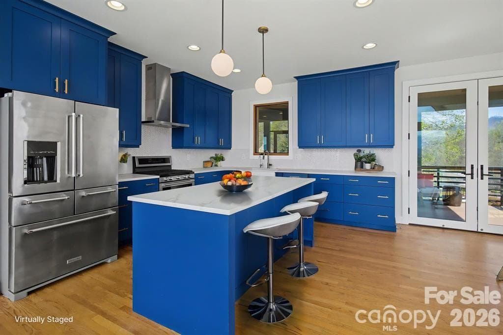 Kitchen has lots of countertop space, cabinets and an apron-front sink. Kitchen is complete with a gas range. - 8 Nottingham Drive, Candler