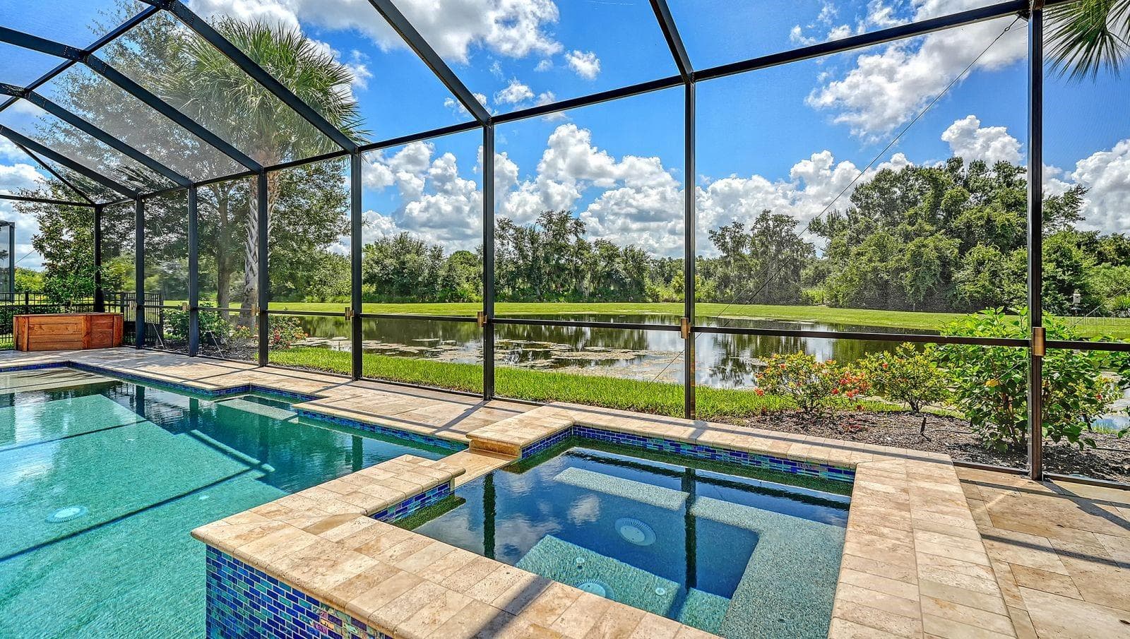 Single Family Residence at 7997 GRANDE SHORES DR, LAKEWOOD RANCH, photo 4 of 89