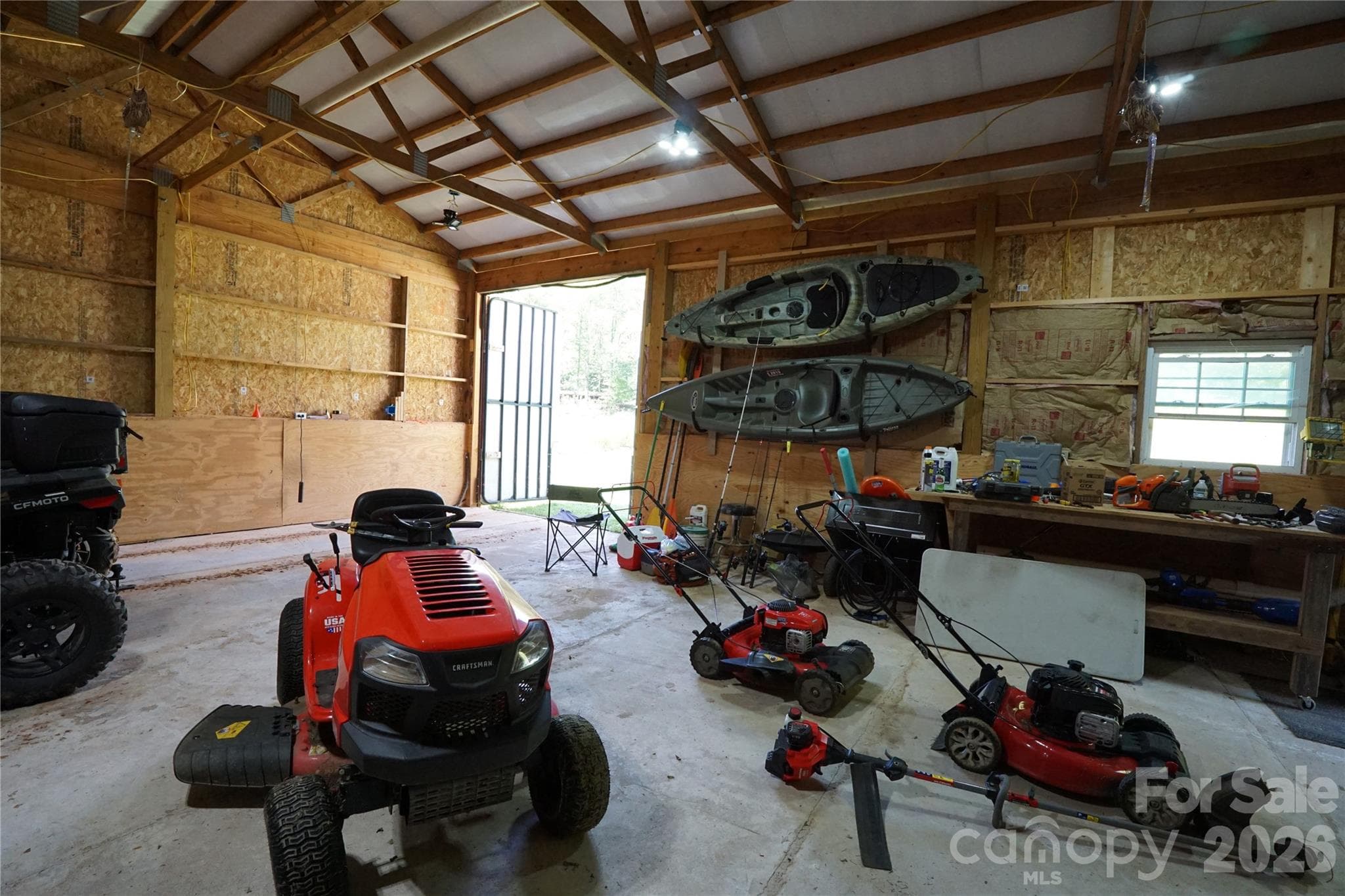 744 SF workshop with cement floor, electricity, and water just outside entrance. - Mill Spring