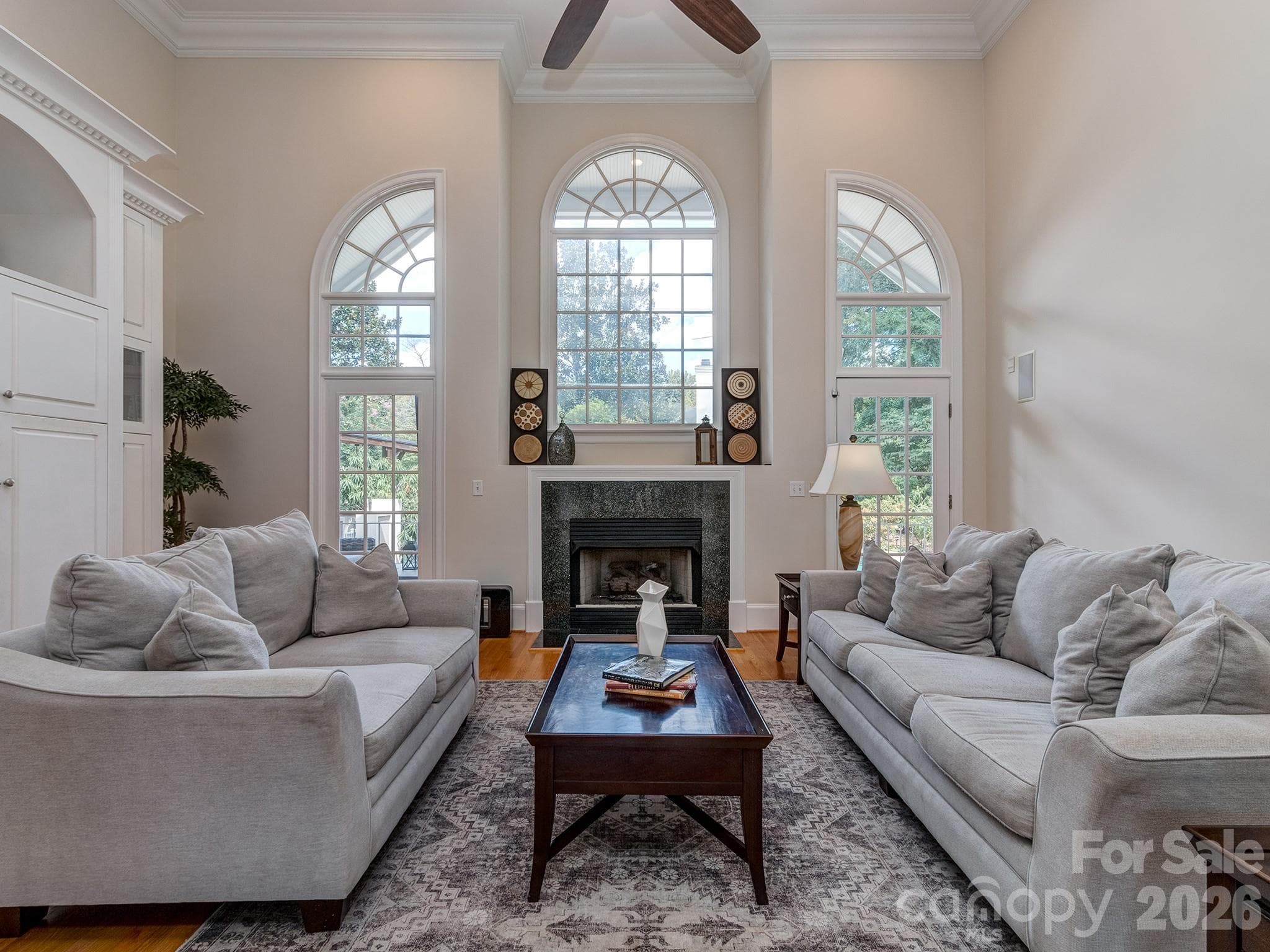 Living room with custom built-ins - 1733 White Pond Lane, Waxhaw