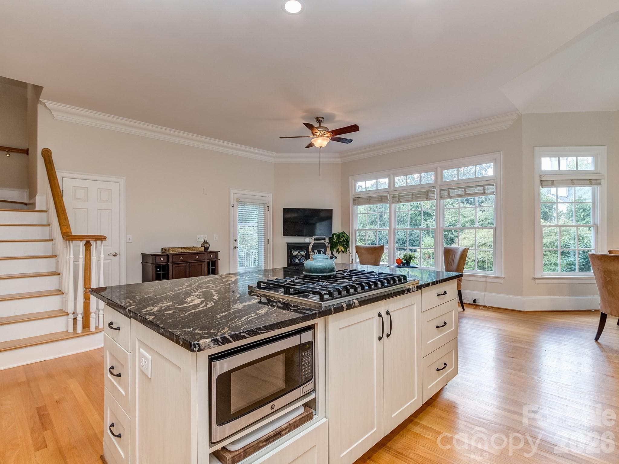 Large kitchen island with gas cooktop - 1733 White Pond Lane, Waxhaw
