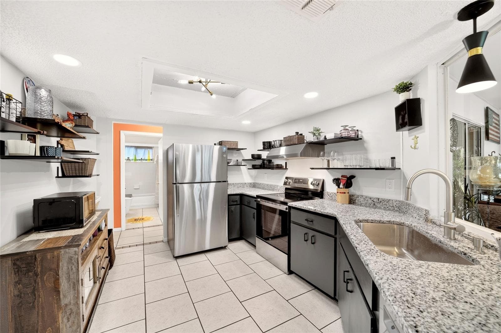 It has everything you need and the appliances you want with the SS dishwasher too - 9282 SW 109TH LN, OCALA