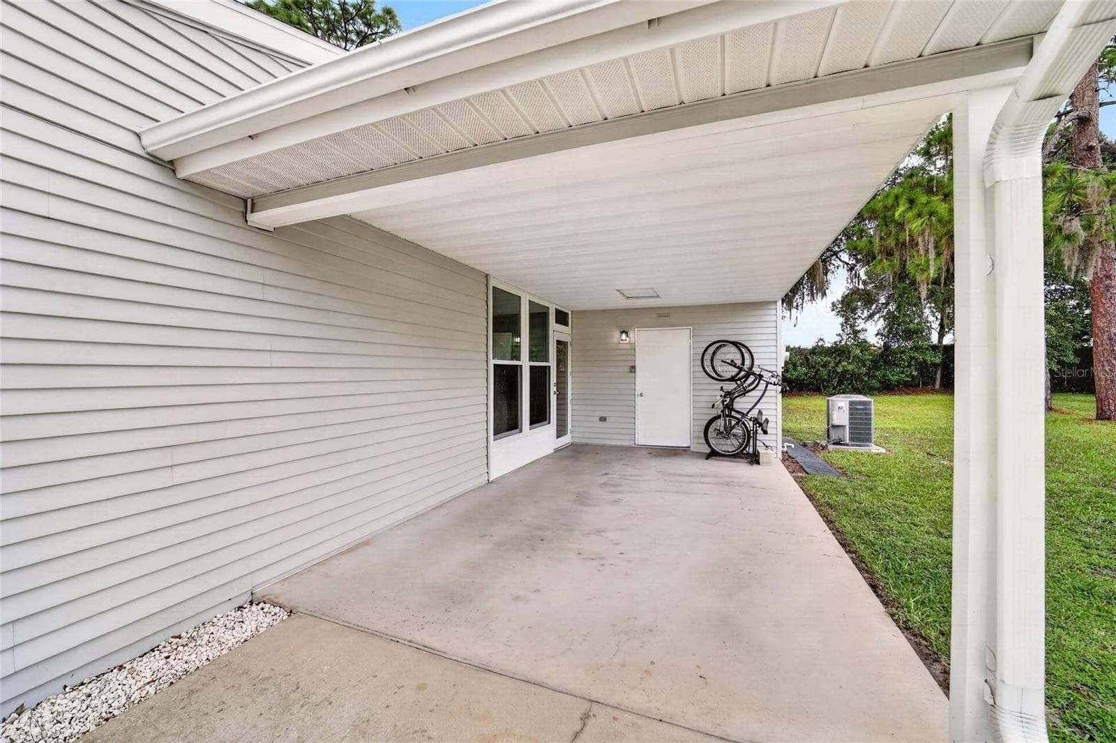 Carport and Driveway Parking and attached shed for more STORAGE - 9282 SW 109TH LN, OCALA