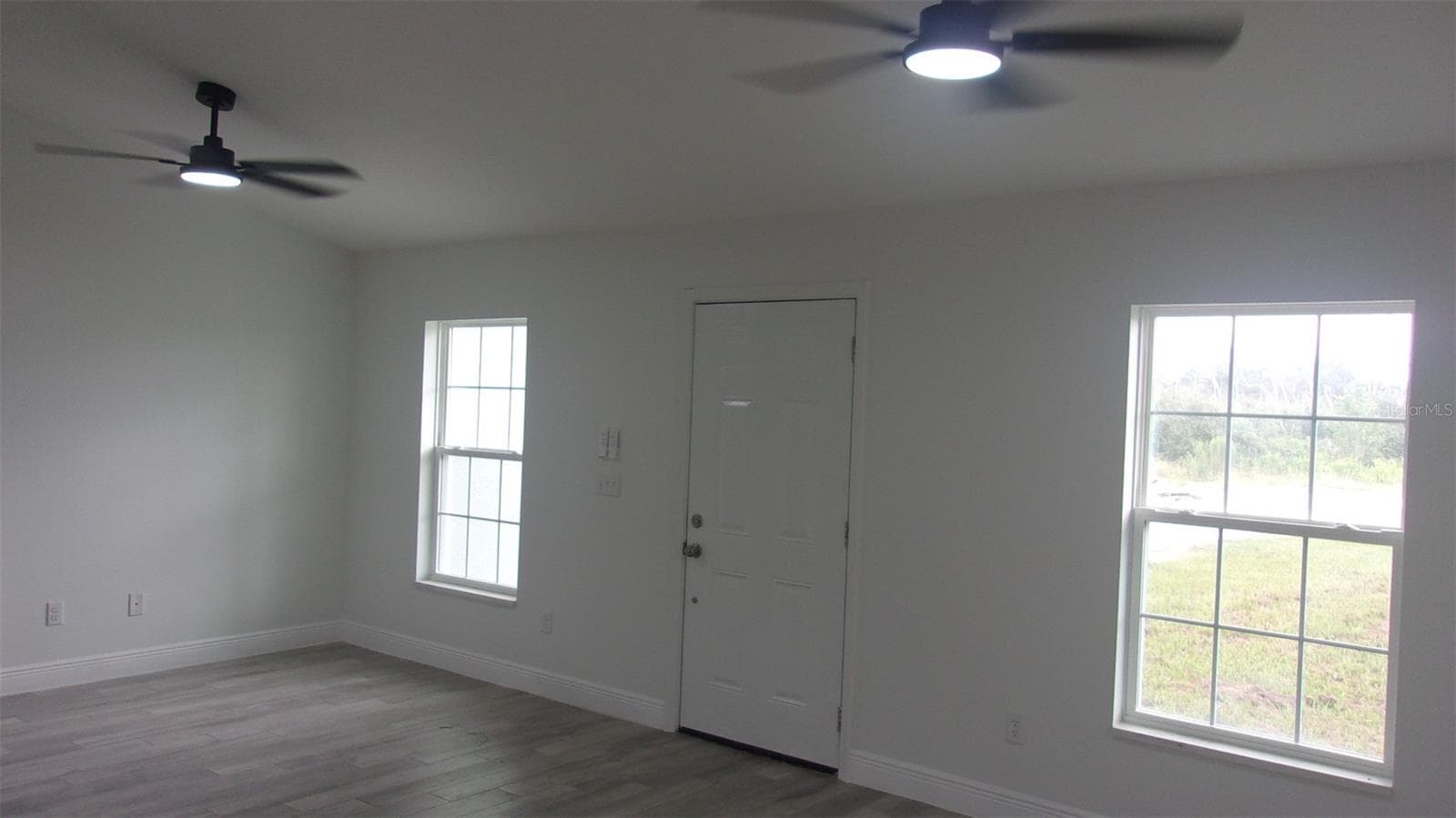 Living - Dining Room Combo View 2 - 8410 SW 157TH LN, DUNNELLON