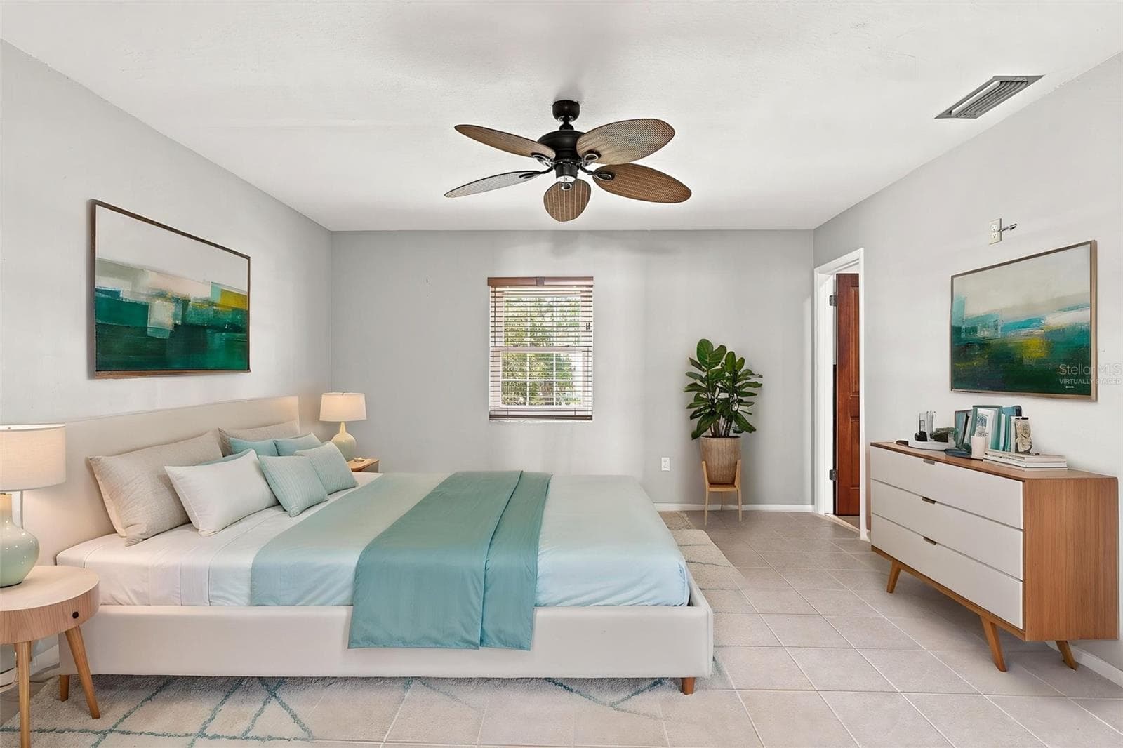 Virtually Staged Large Primary Bedroom Offering Plenty of Space and Natural Light - 155 MORGAN LN SE, PORT CHARLOTTE