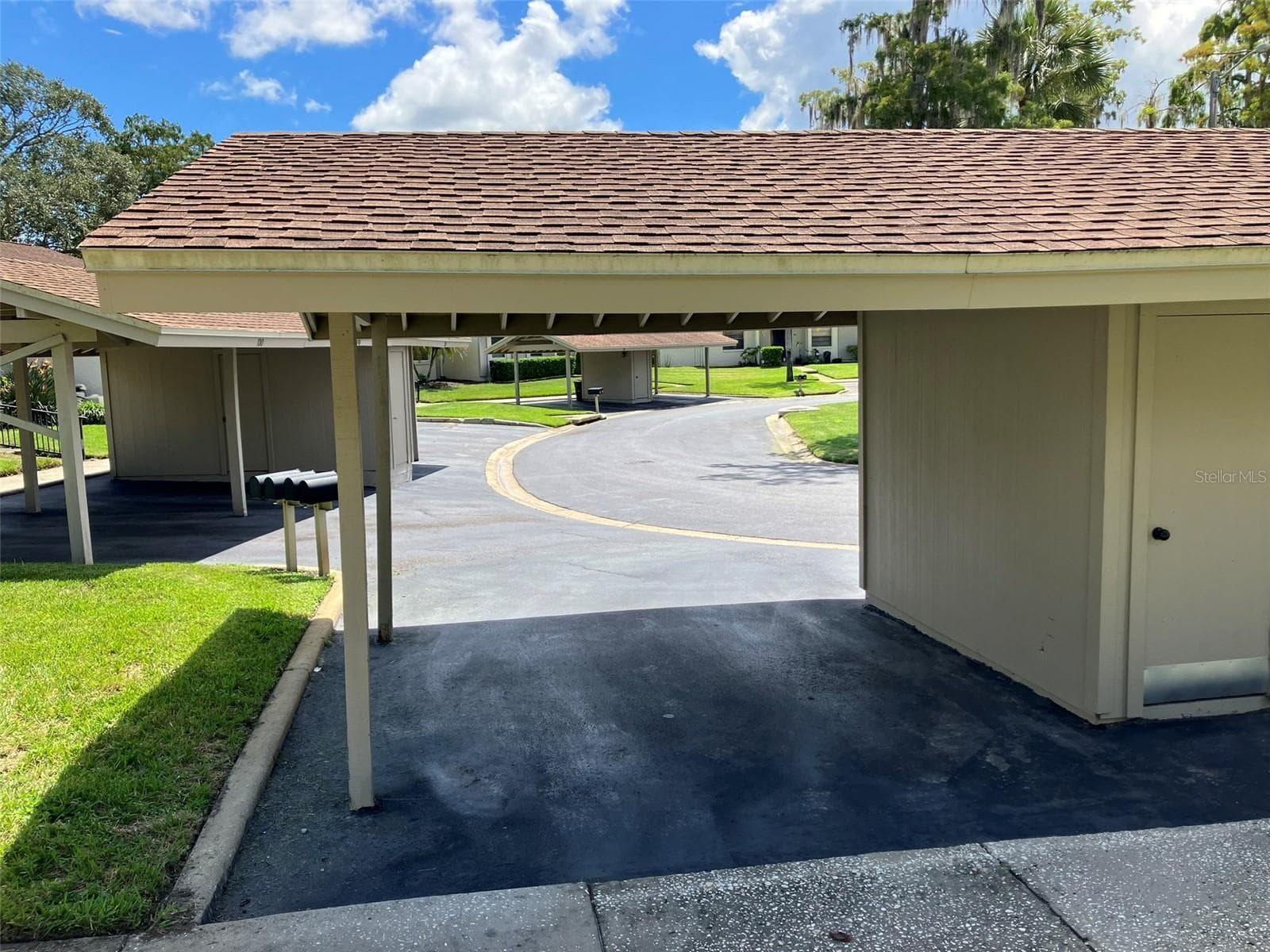 Carport and Storage Room - 110 EVELYN CT, OLDSMAR
