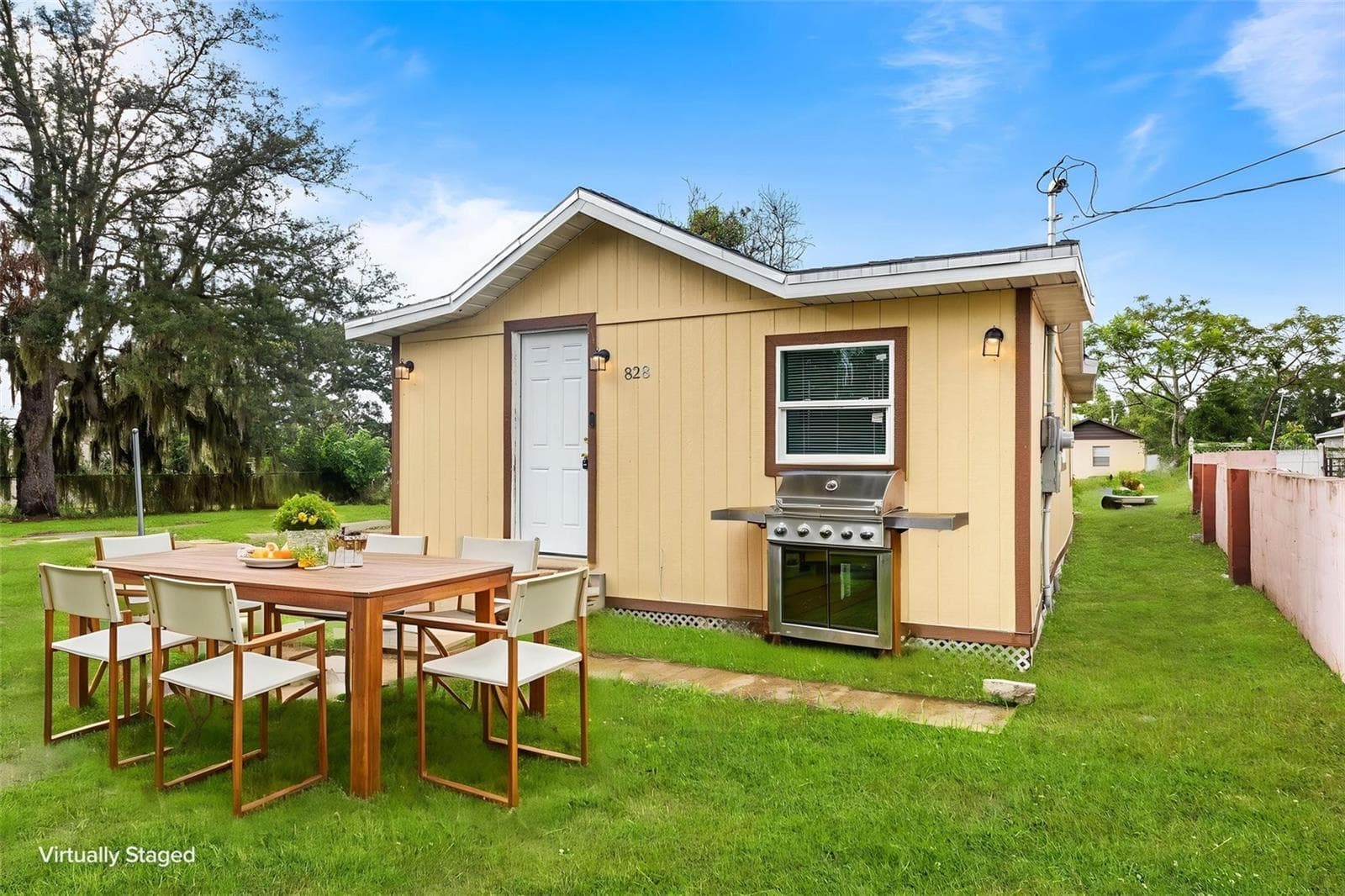 virtual stage backyard - 828 BOOKER AVE, SEBRING