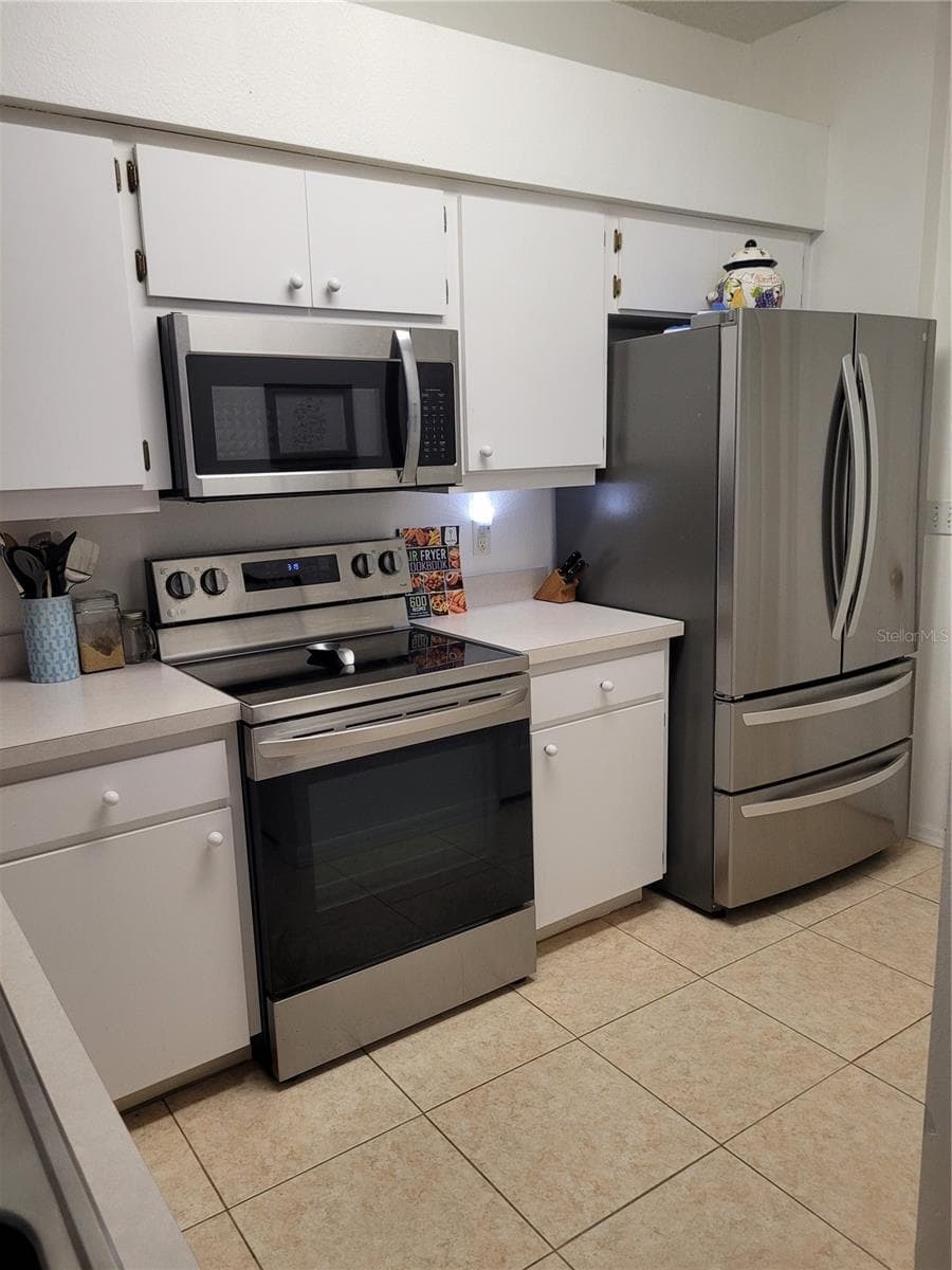 Condominium at 735 TREMONT GREENS LN #48, SUN CITY CENTER, photo 9 of 37