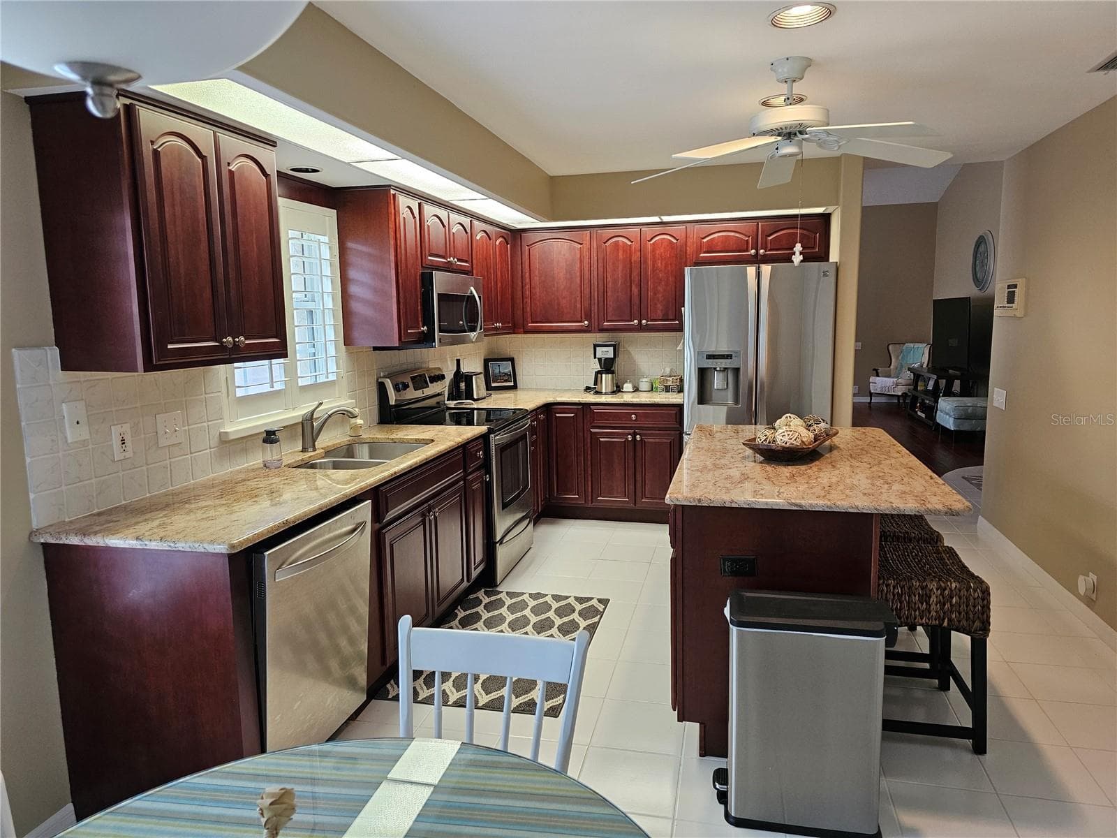 Kitchen with view to living room - 8351 CREEKVIEW LN, ENGLEWOOD