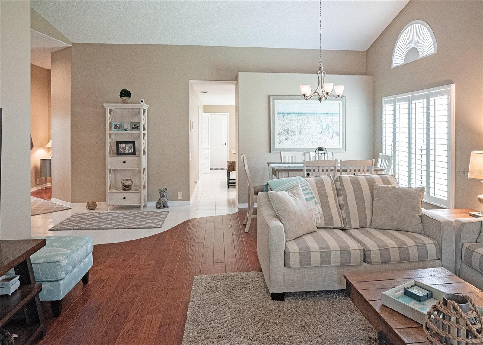 Living Room looking towards the kitchen and left to entrance and guest quarter - 8351 CREEKVIEW LN, ENGLEWOOD
