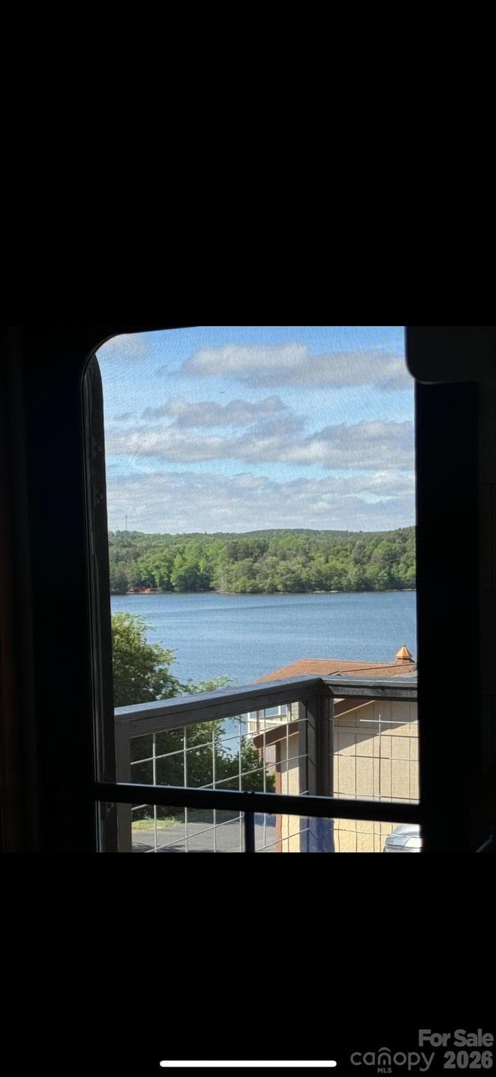 View from inside the caper at the dining table - 221 Grand View Drive, New London