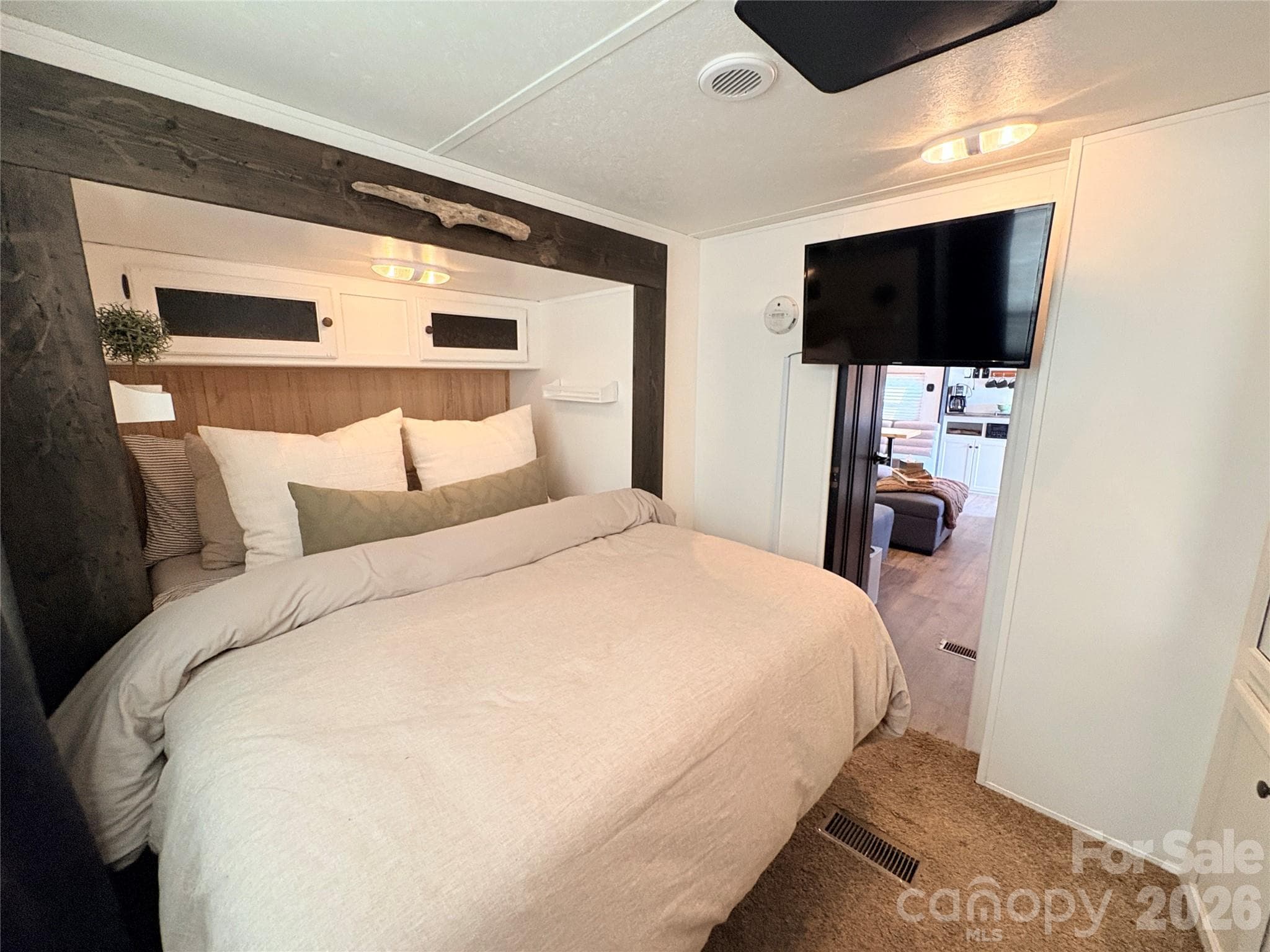 Mounted TV has a swivel arm to watch TV from Bed - 221 Grand View Drive, New London