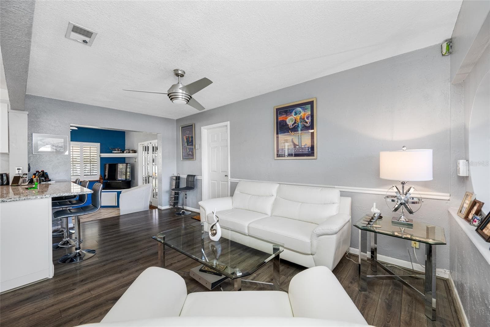 Living room w/access to Garage and workshop. - 8444 8TH WAY N, ST PETERSBURG