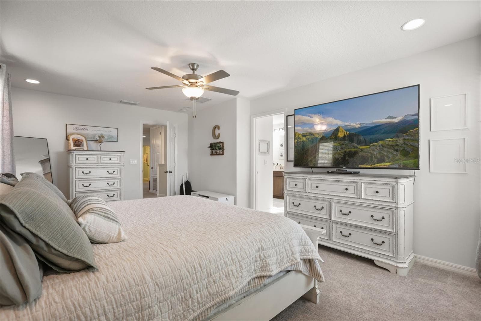 Another view of the spacious primary bedroom. - 7104 DILLY LAKE AVE, GROVELAND