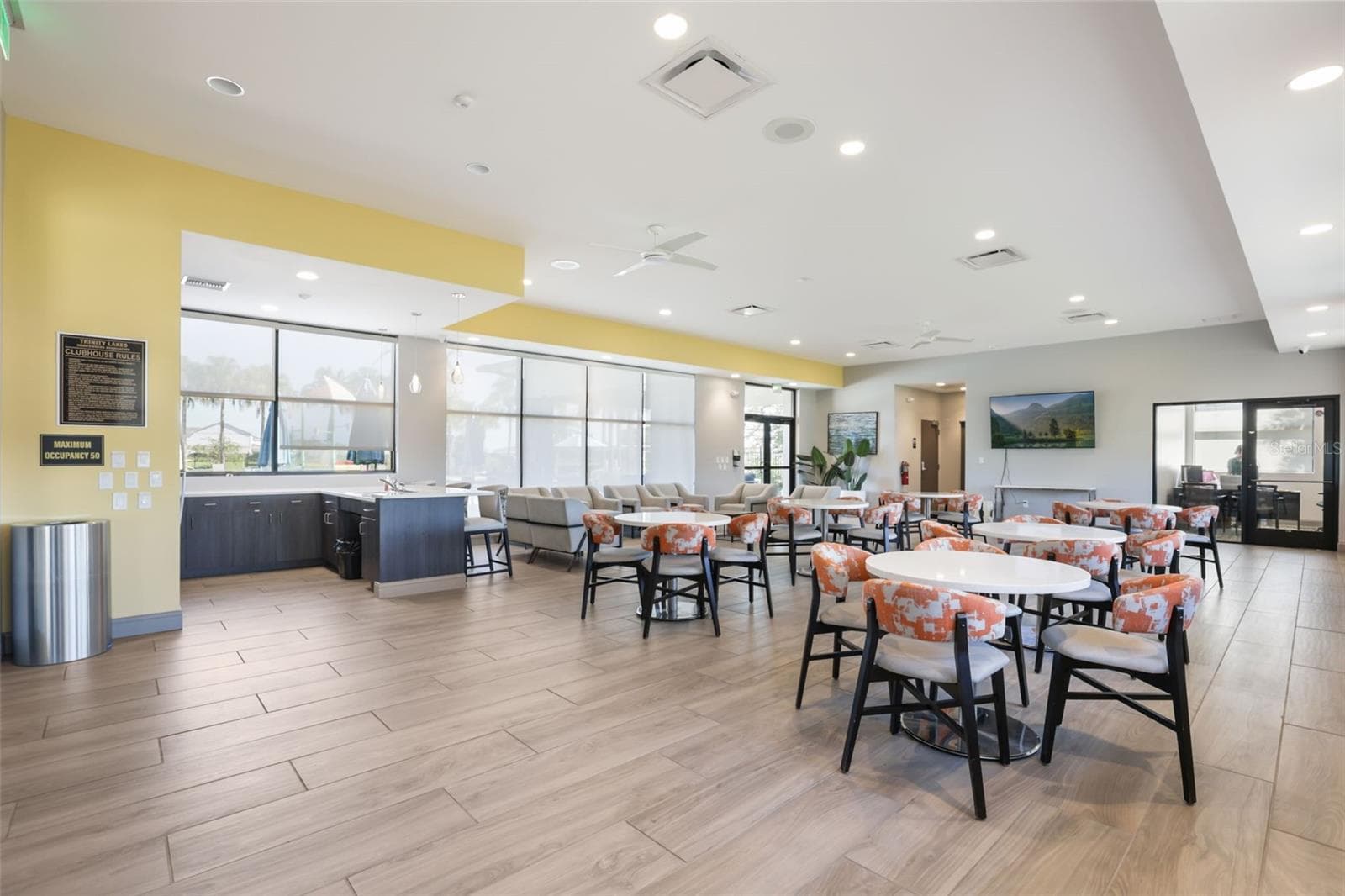 Spacious Trinity Lakes clubhouse with plenty of seating for gatherings and community events. - 7104 DILLY LAKE AVE, GROVELAND