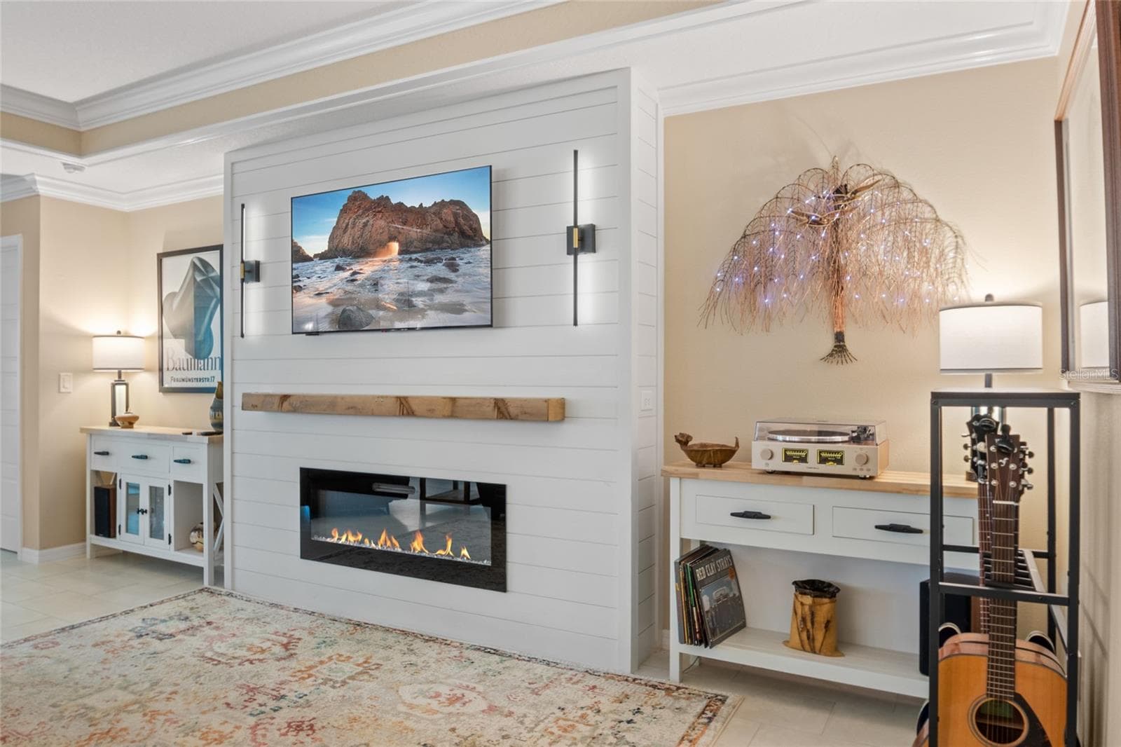 TV/Electric Fireplace Wall with mantel. - 4529 SAMANTHA CT, THE VILLAGES