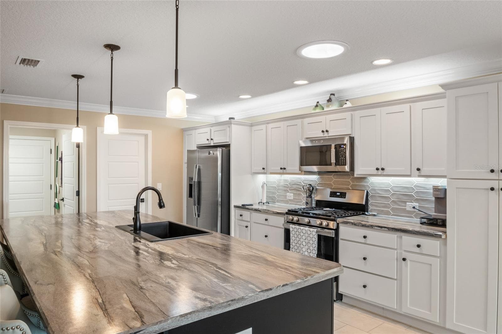 Stainless steal appliances. - 4529 SAMANTHA CT, THE VILLAGES
