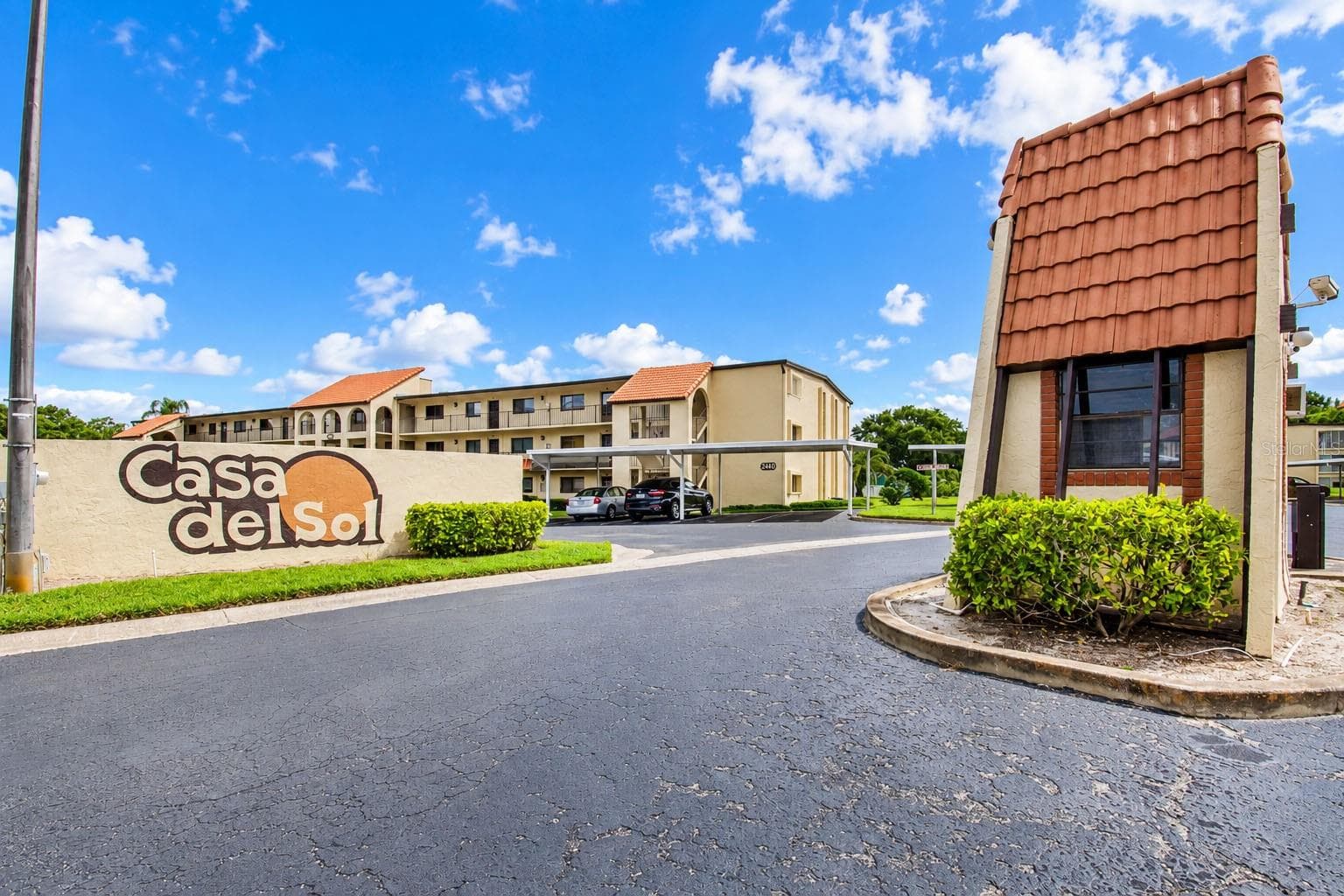 Main entrance to Casa Del Sol community. - 2440 WINDING CREEK BLVD #307, CLEARWATER