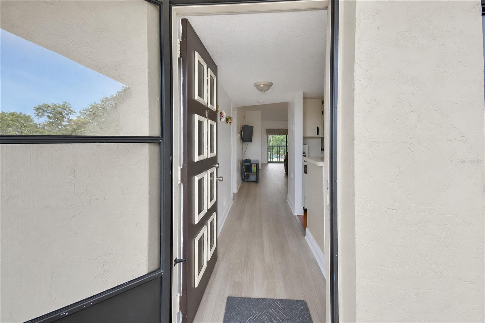 Entry to this third-floor condominium. - 2440 WINDING CREEK BLVD #307, CLEARWATER