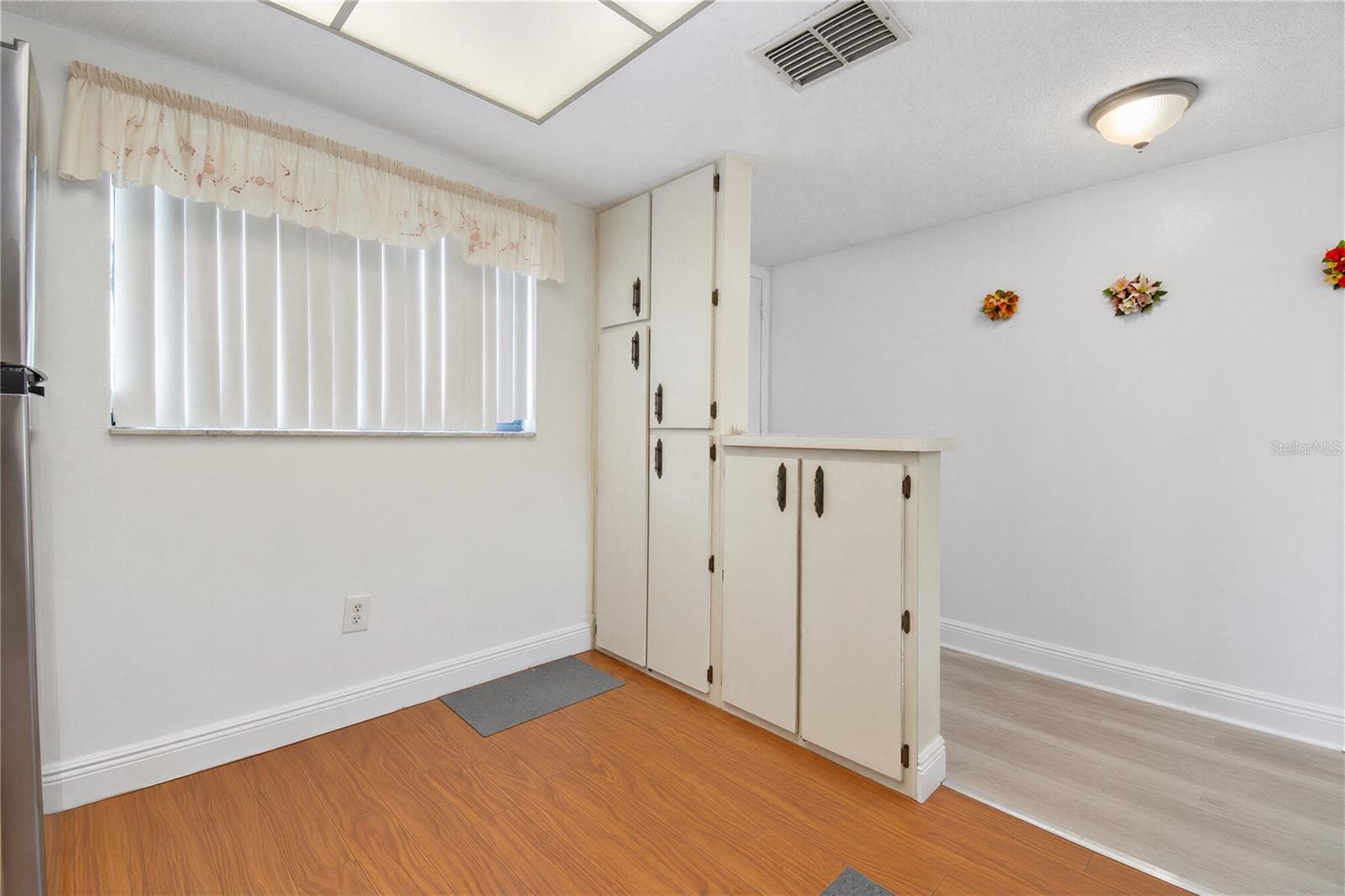 Kitchen view looking toward the main entry. - 2440 WINDING CREEK BLVD #307, CLEARWATER