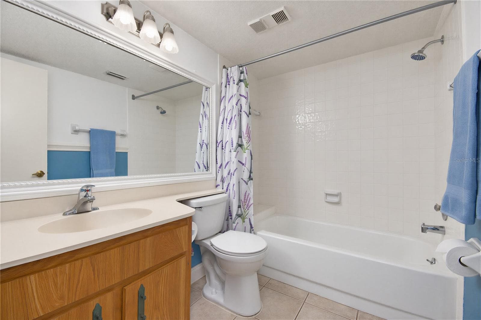 Bathroom with tub and shower combination. - 2440 WINDING CREEK BLVD #307, CLEARWATER