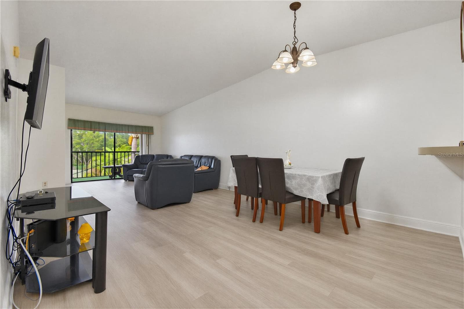 Bright and spacious living and dining area. - 2440 WINDING CREEK BLVD #307, CLEARWATER
