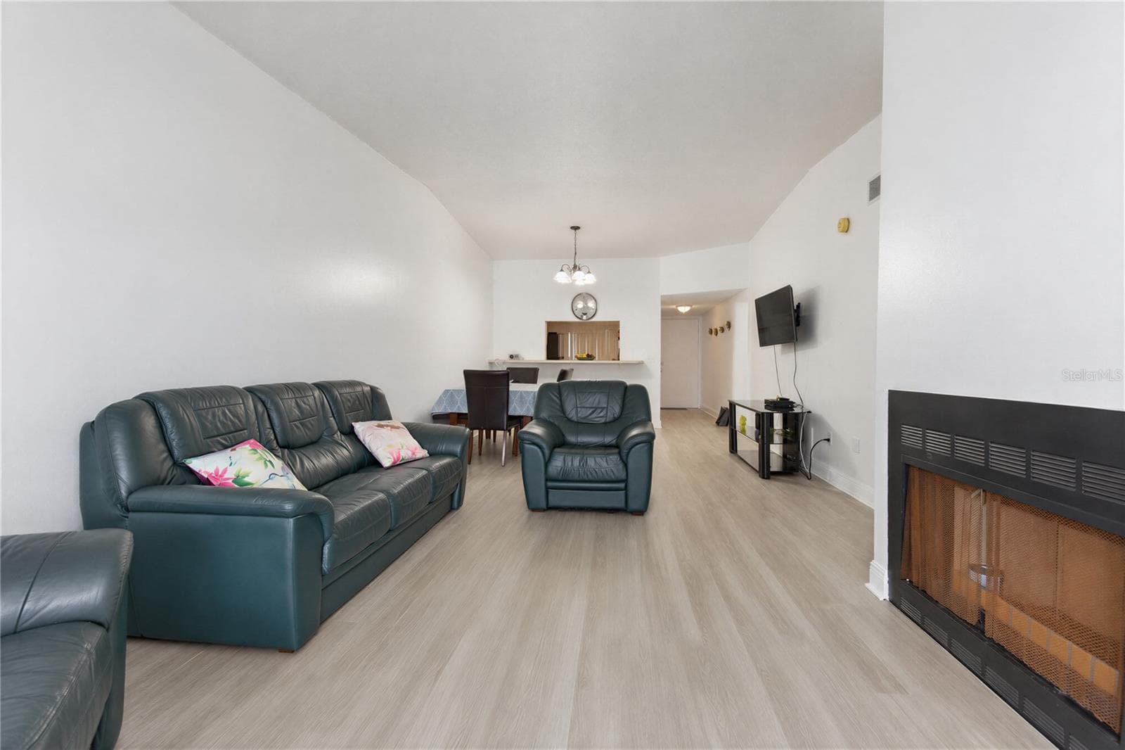 Spacious living area with natural light. - 2440 WINDING CREEK BLVD #307, CLEARWATER