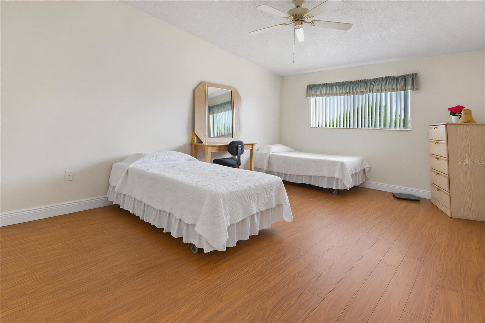 Spacious primary bedroom with natural light. - 2440 WINDING CREEK BLVD #307, CLEARWATER