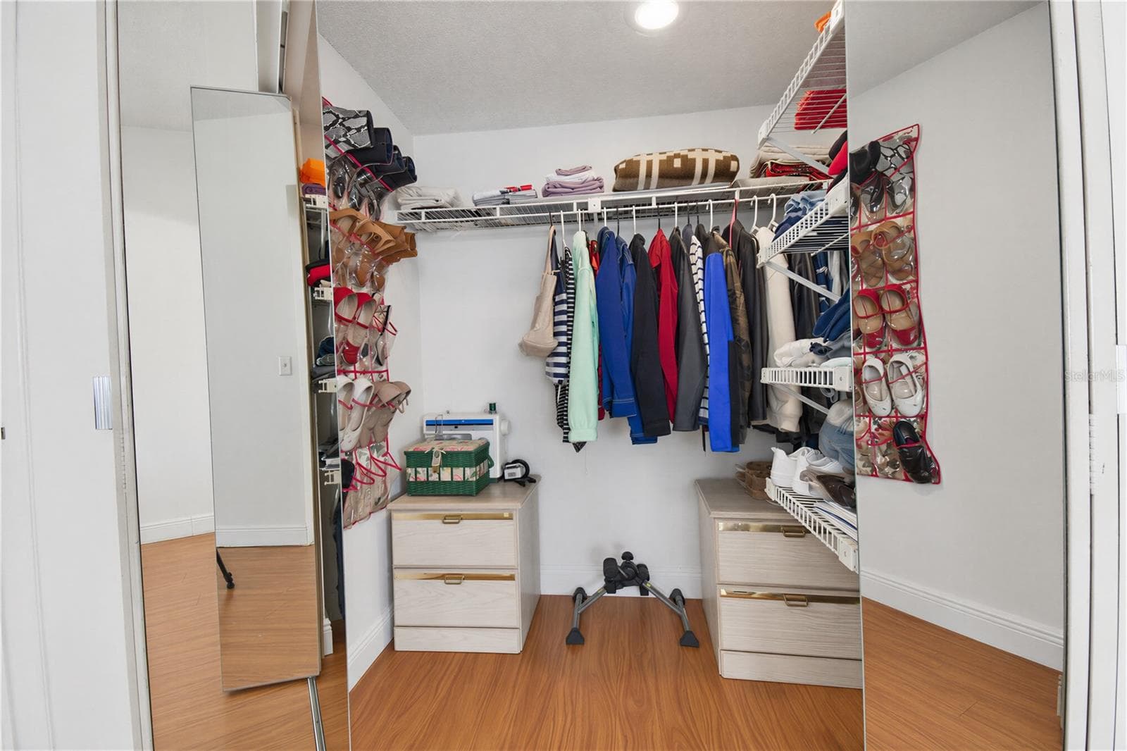 Spacious primary bedroom walk-in closet. - 2440 WINDING CREEK BLVD #307, CLEARWATER