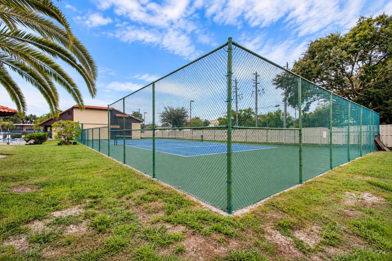 Community tennis court. - 2440 WINDING CREEK BLVD #307, CLEARWATER