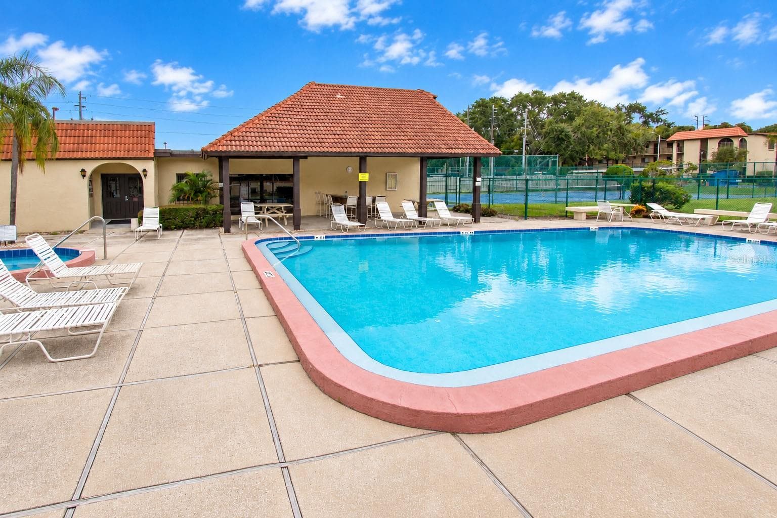 Additional view of the community swimming pool. - 2440 WINDING CREEK BLVD #307, CLEARWATER