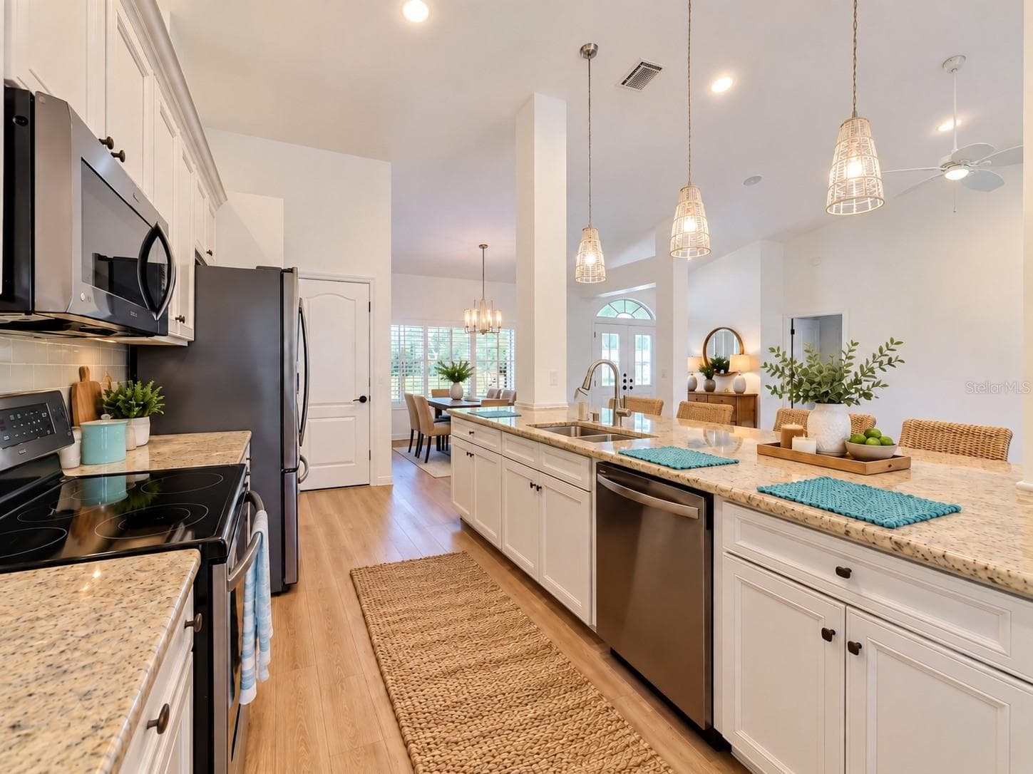 Plenty of cabient space throughout the kitchen for all your storge needs. - 4415 HIGHLAND OAKS CIR, SARASOTA
