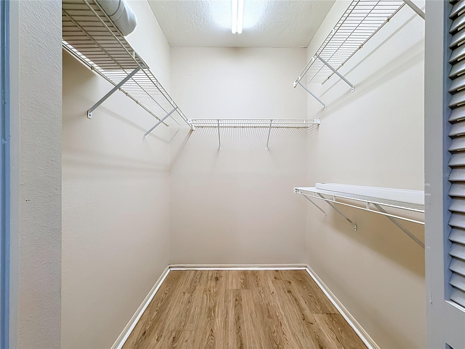 Bedroom #2 walk in closet. - 4415 HIGHLAND OAKS CIR, SARASOTA