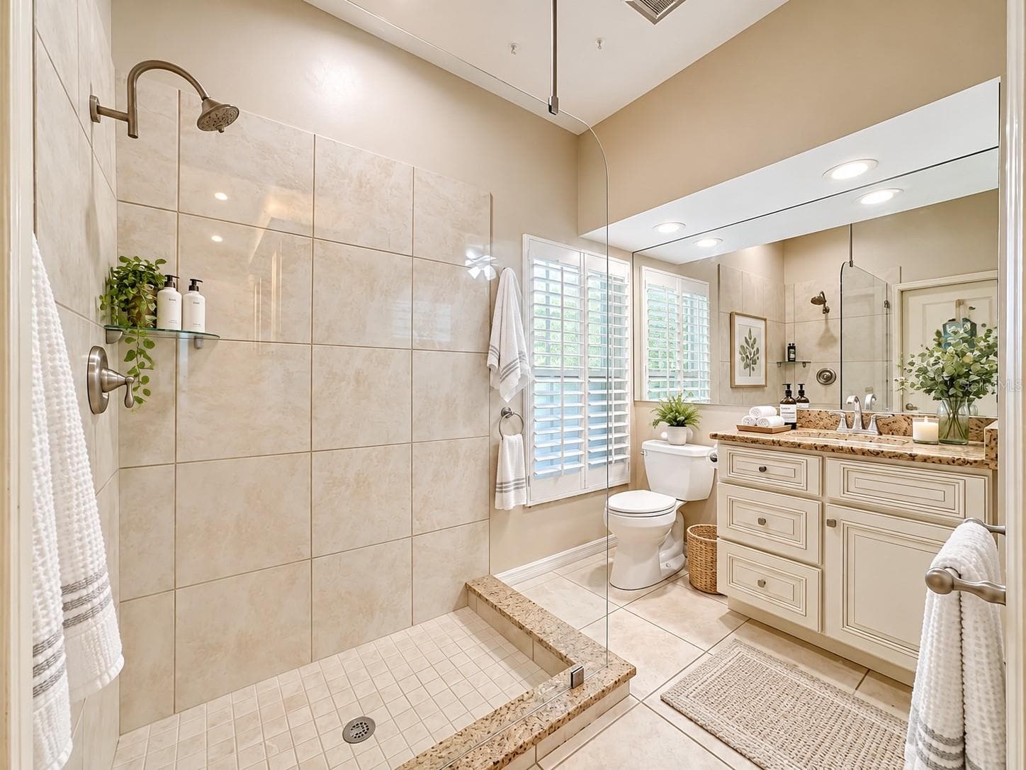 Bathroom #2 Frameless glass shower, tiled flooring. - 4415 HIGHLAND OAKS CIR, SARASOTA