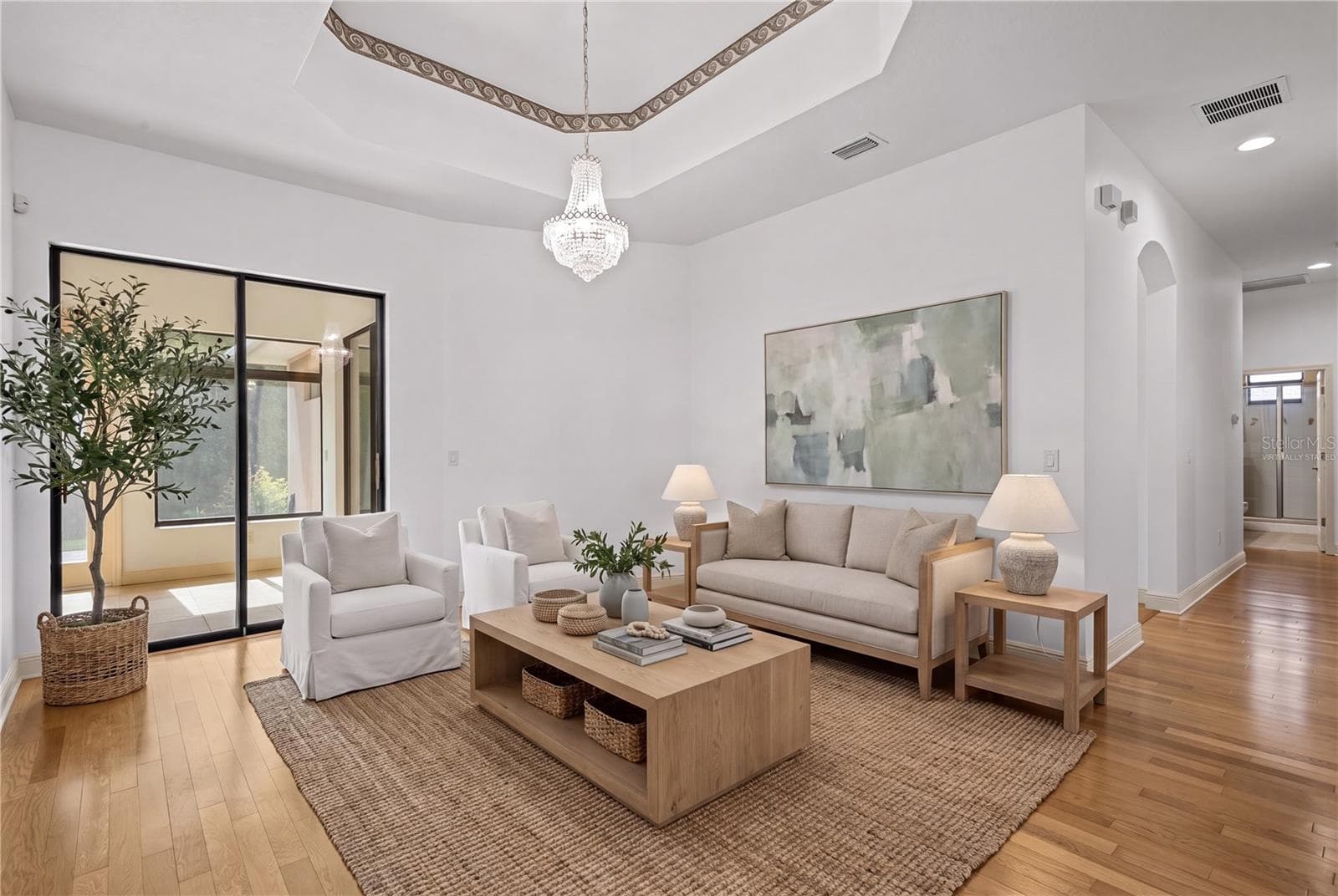 Architectural details add character while maintaining a warm and welcoming atmosphere. - virtually staged - 14834 MAN O WAR DR, ODESSA