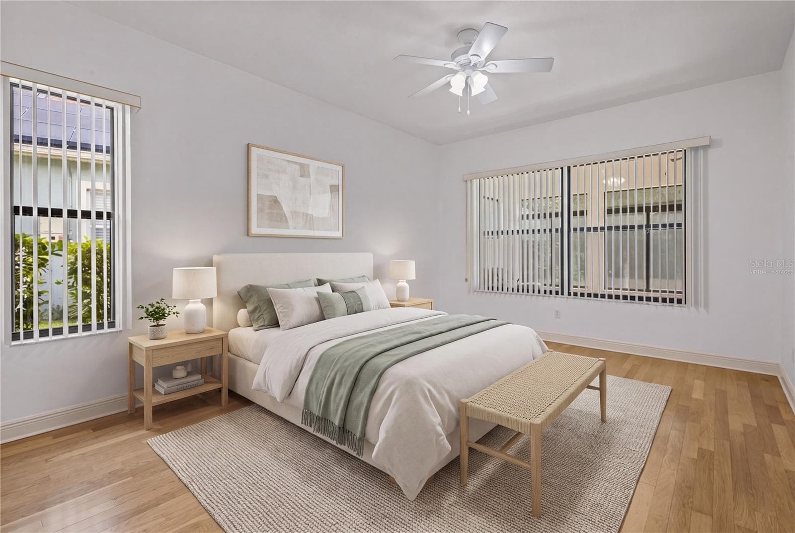 The spacious primary bedroom provides a peaceful retreat en suite bathroom. - virtually staged - 14834 MAN O WAR DR, ODESSA