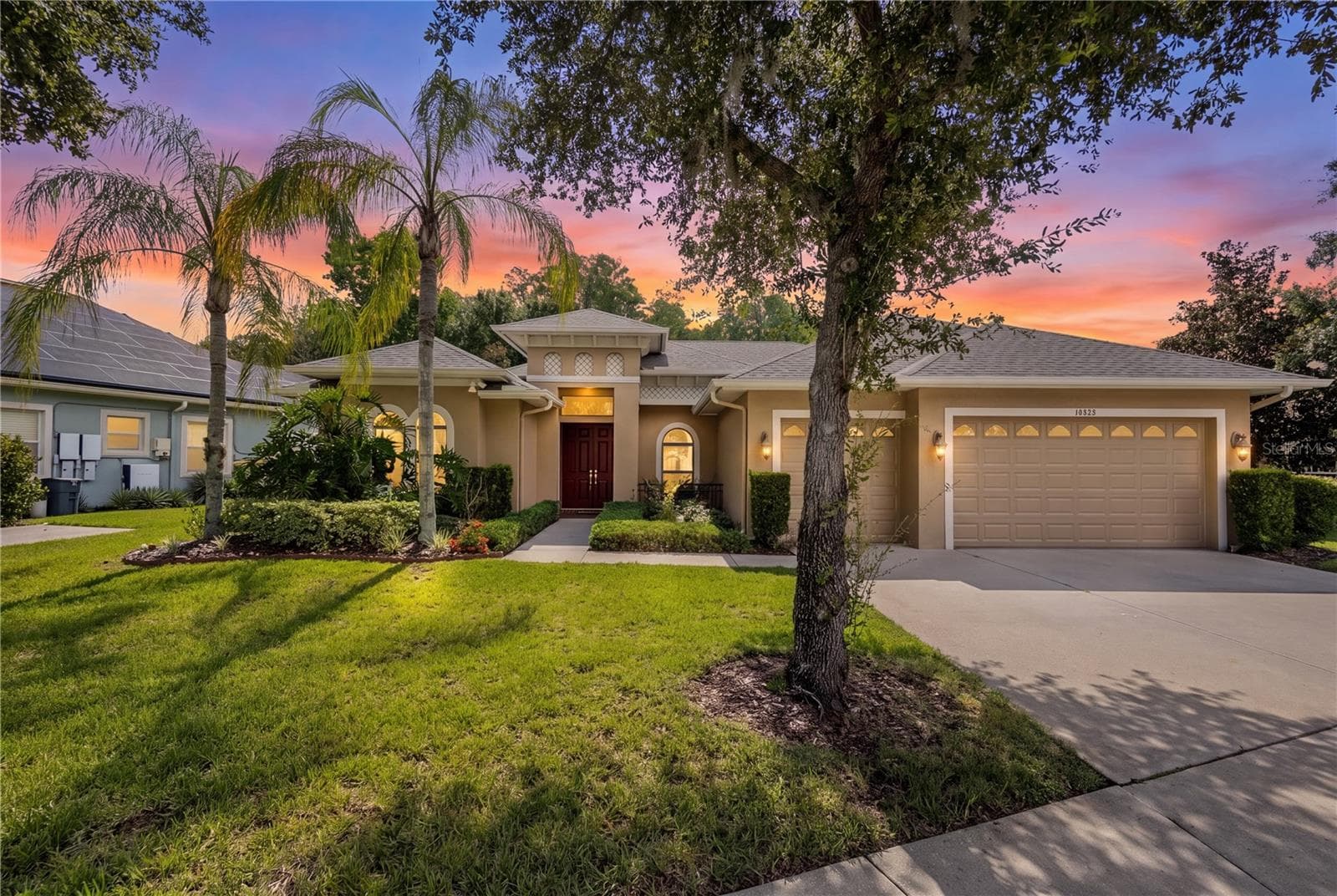 Welcome to this custom-built Grey Hawk at Lake Polo home, perfectly positioned on a quiet cul-de-sac with protected conservation views, exceptional privacy, and no CDD fees. - 14834 MAN O WAR DR, ODESSA