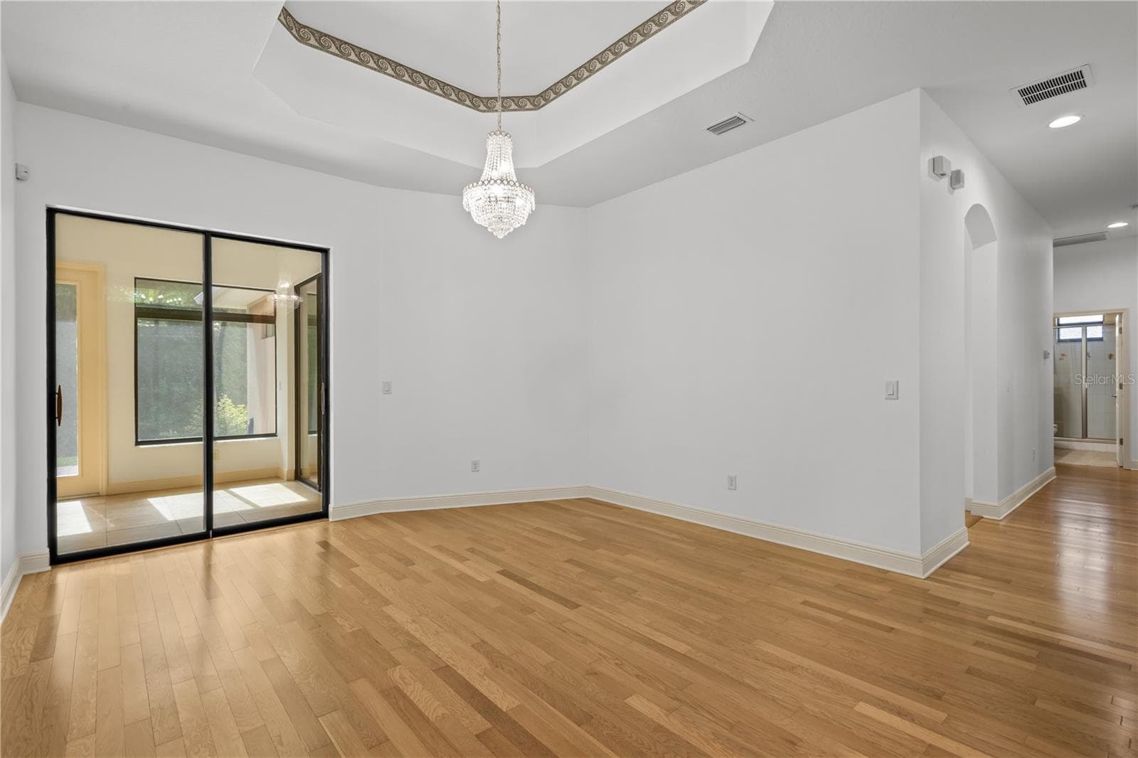 A spacious dining area offers an inviting setting for everyday meals and special gatherings. - 14834 MAN O WAR DR, ODESSA