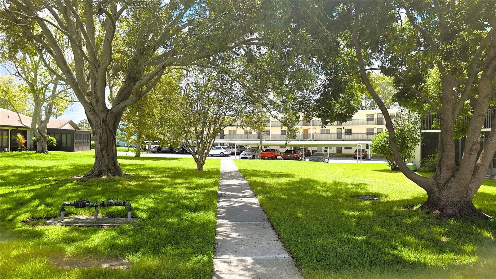 Condominium at 1450 HEATHER RIDGE BLVD #201, DUNEDIN, photo 52 of 56