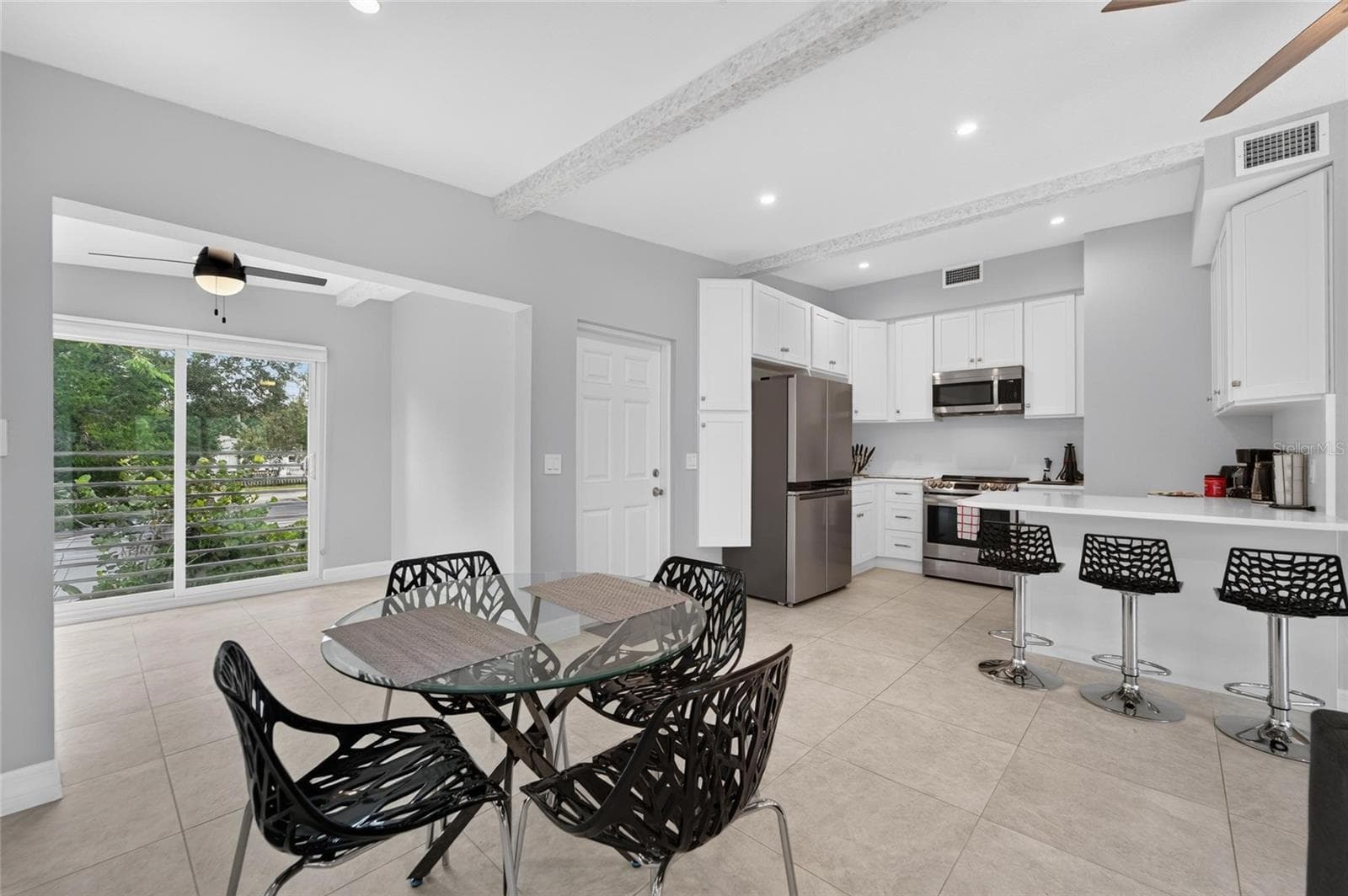 Unit E-Dining area and separate sunroom with glass sliders - 1236 13TH ST, SARASOTA