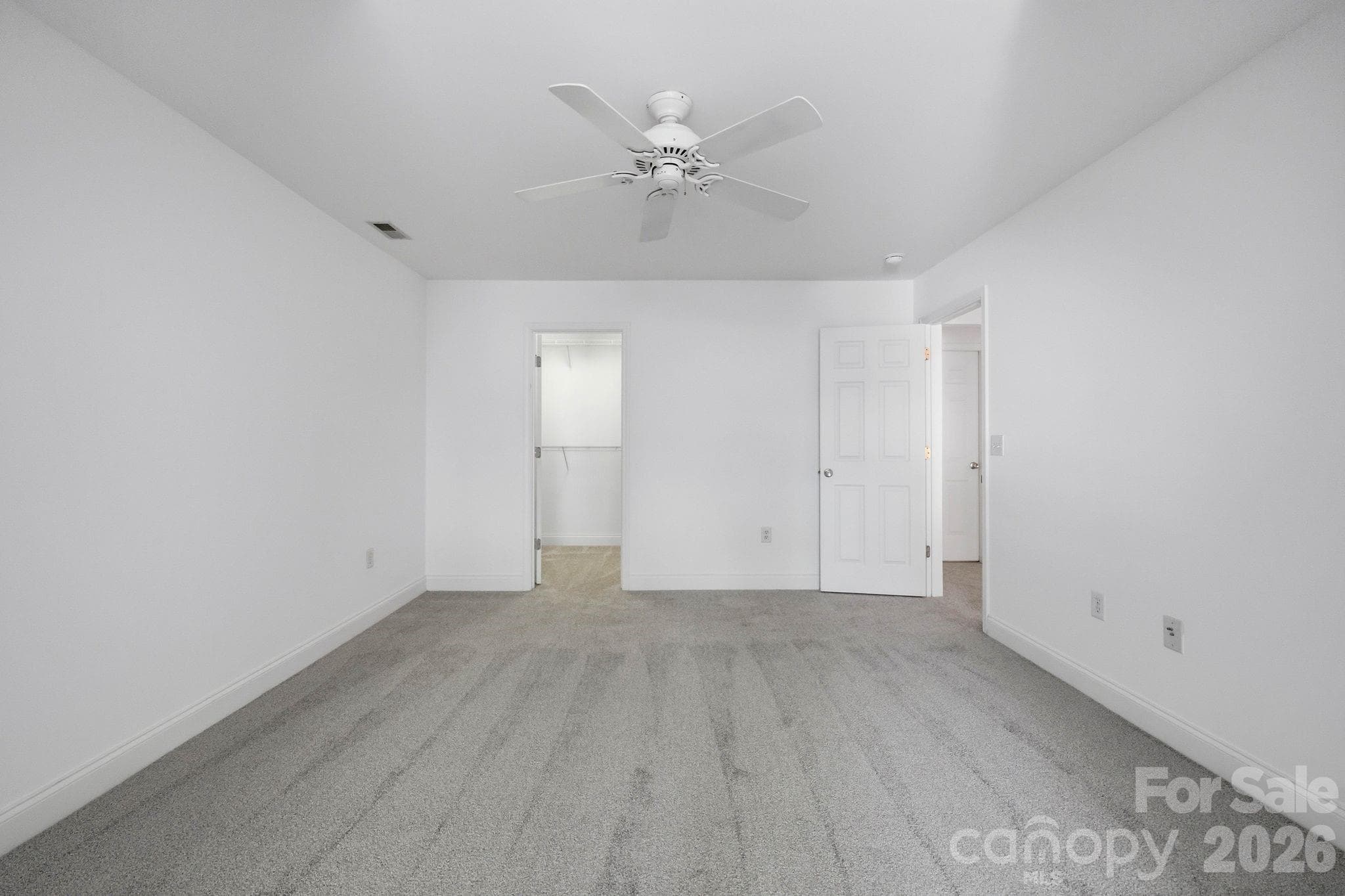 Upstairs bedroom offers a functional layout with room for a variety of furniture arrangements. - 18810 Cloverstone Circle, Cornelius