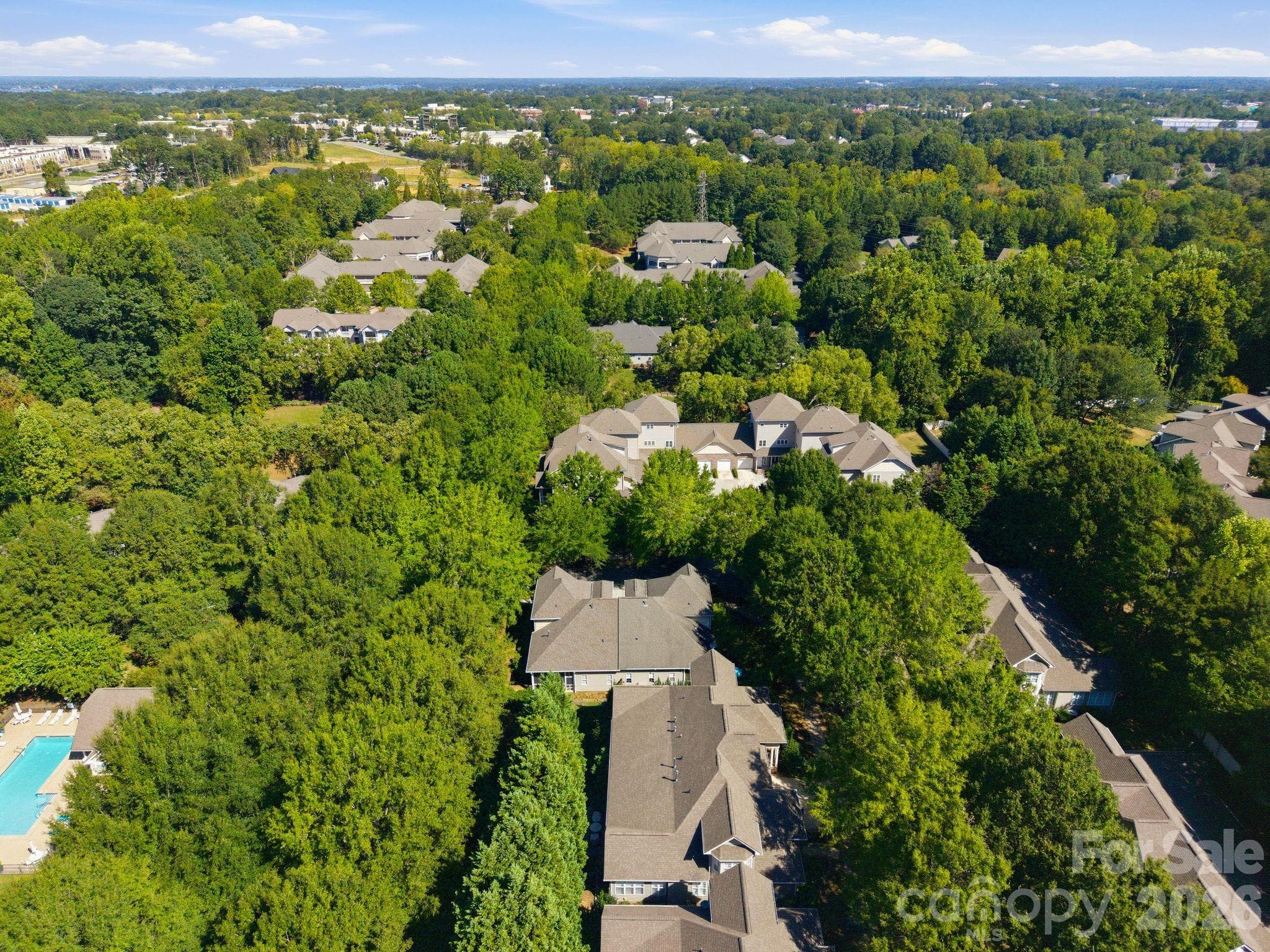 Enjoy community amenities including a neighborhood pool and sidewalks. - 18810 Cloverstone Circle, Cornelius