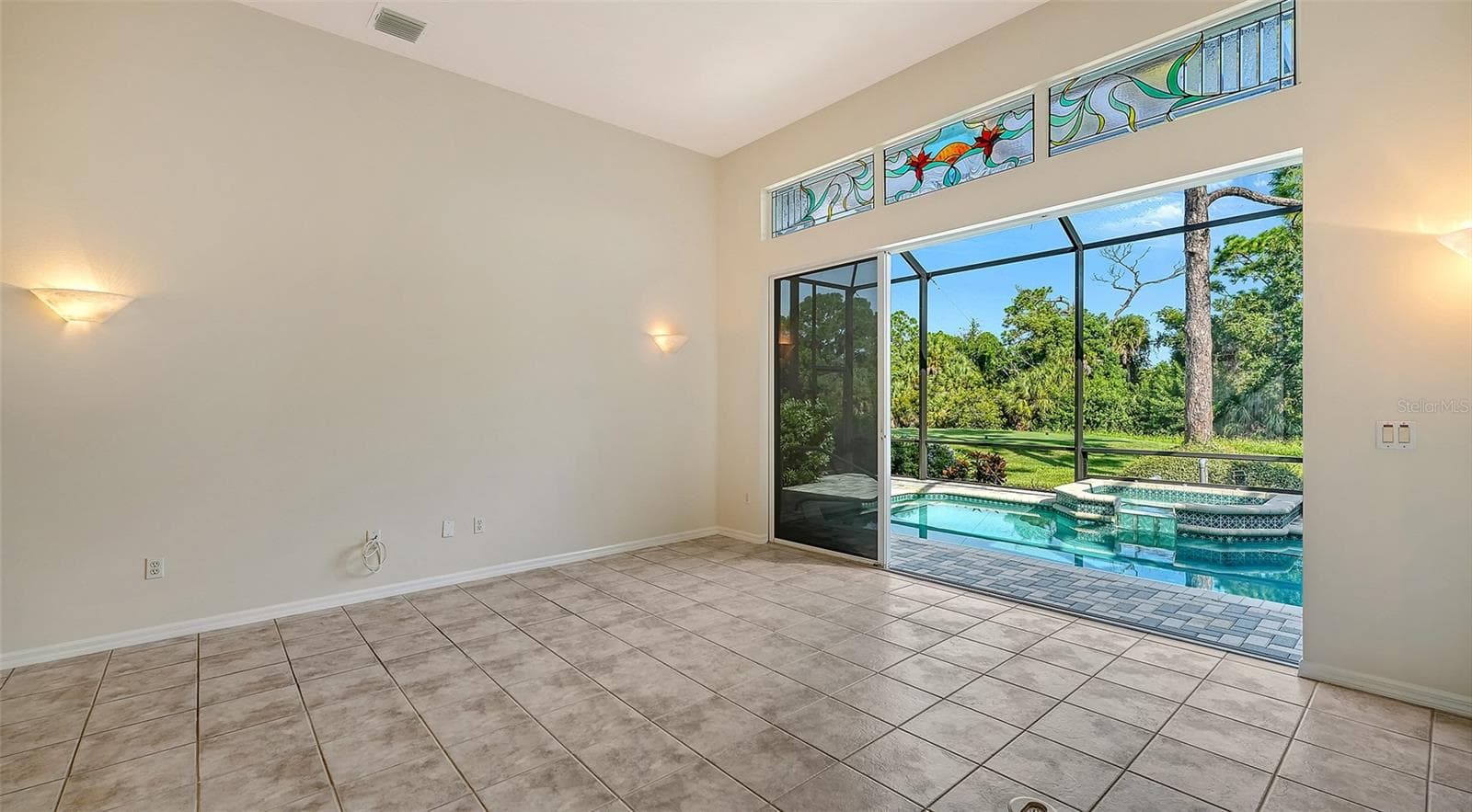 Living area opening onto lanai - 342 MELROSE CT, VENICE