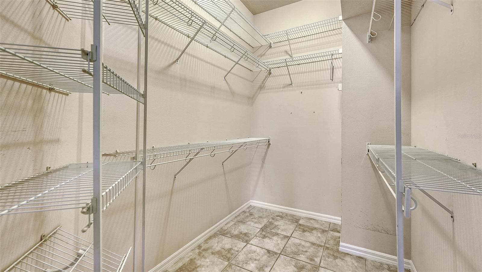 Primary walk in closet - 342 MELROSE CT, VENICE