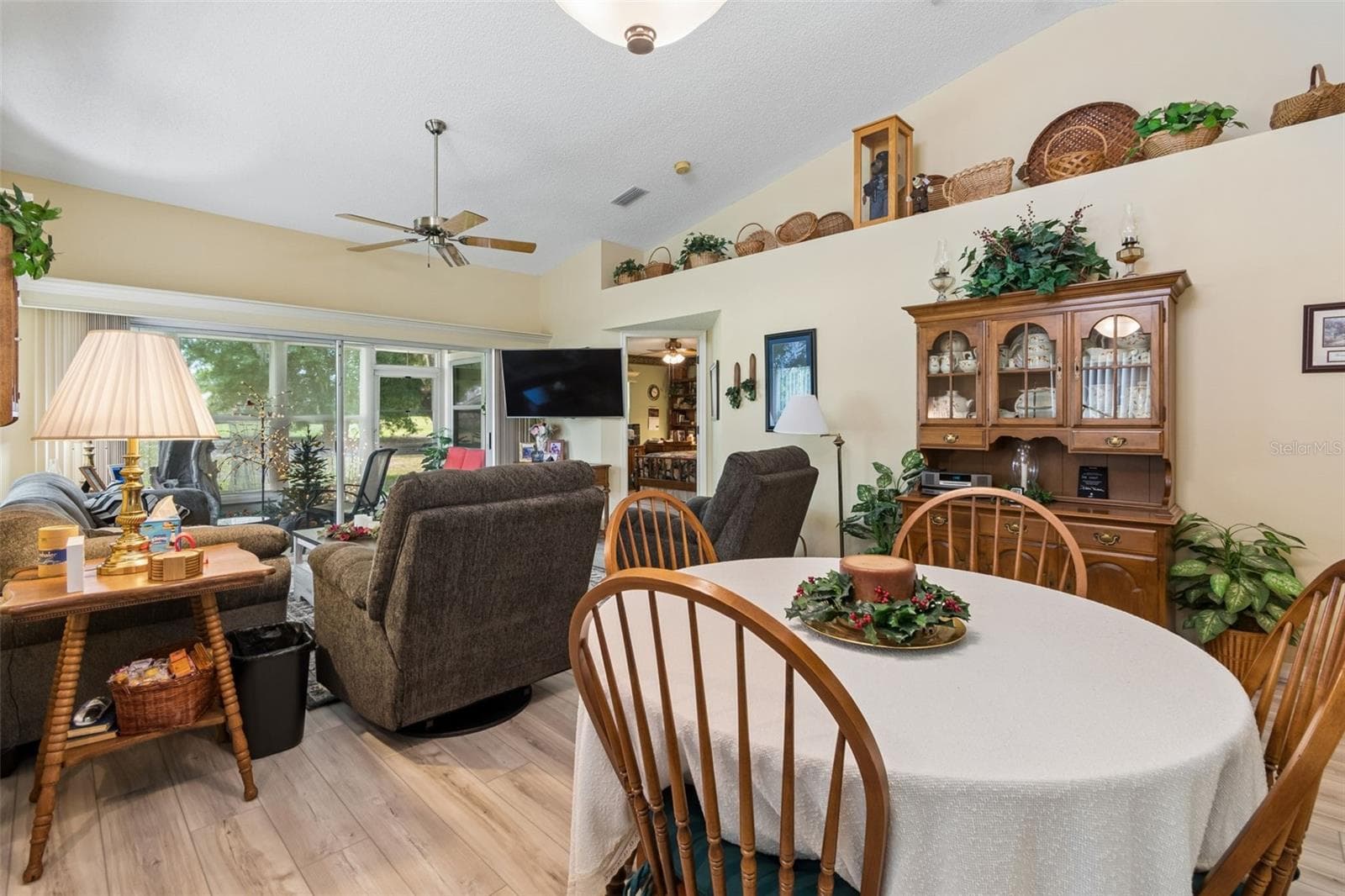Dining room/living room combo - 5213 LOCHMEAD TER, ZEPHYRHILLS