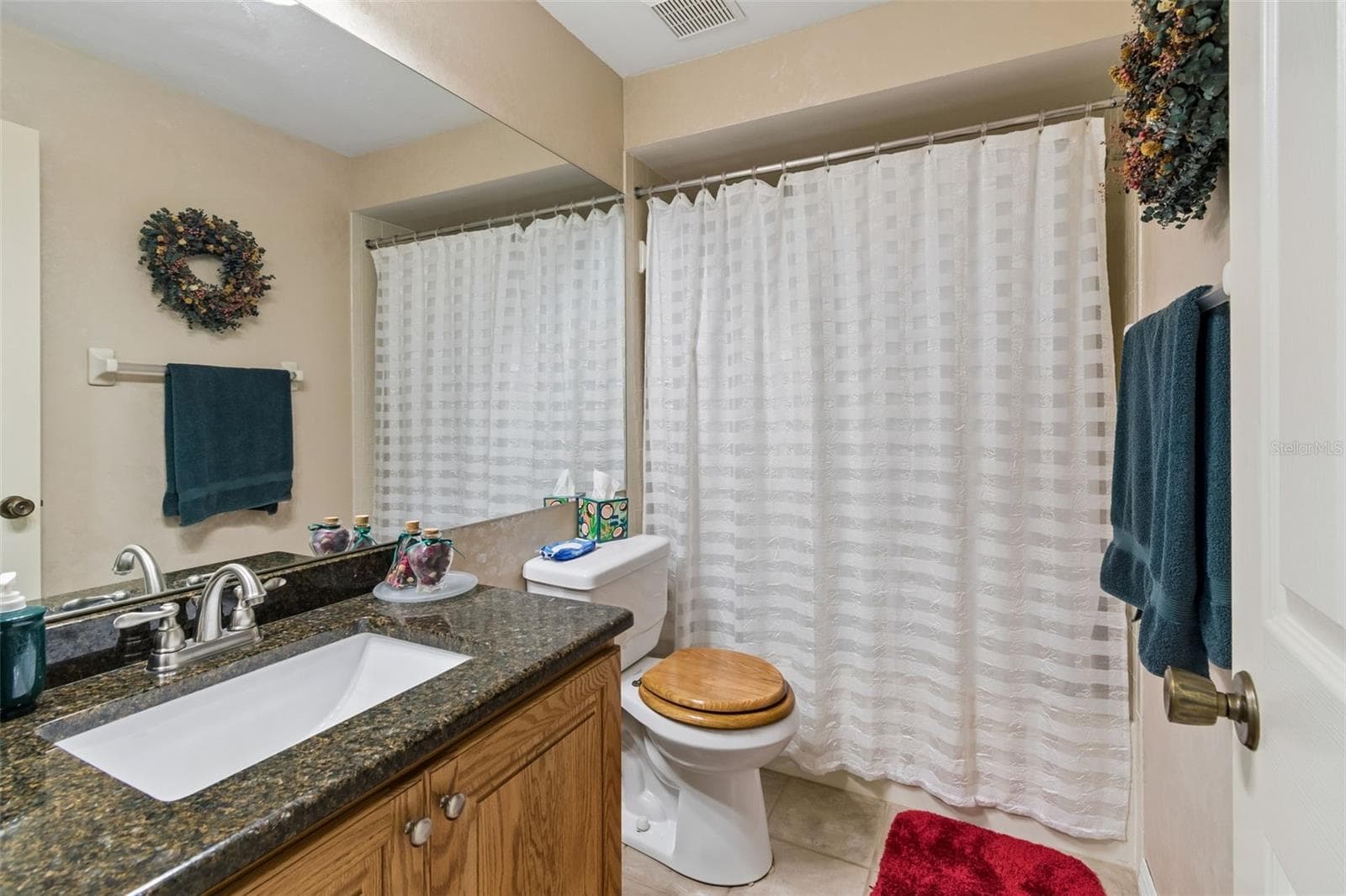 Guest bathroom - 5213 LOCHMEAD TER, ZEPHYRHILLS