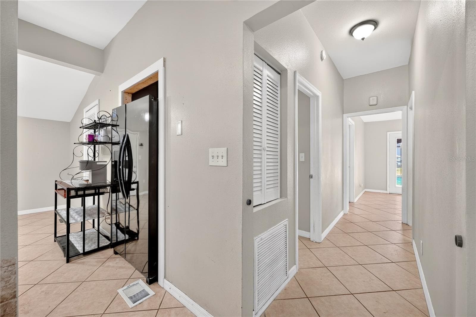 Kitchen into Hallway - 116 W ARBORVITAE LN, POLK CITY
